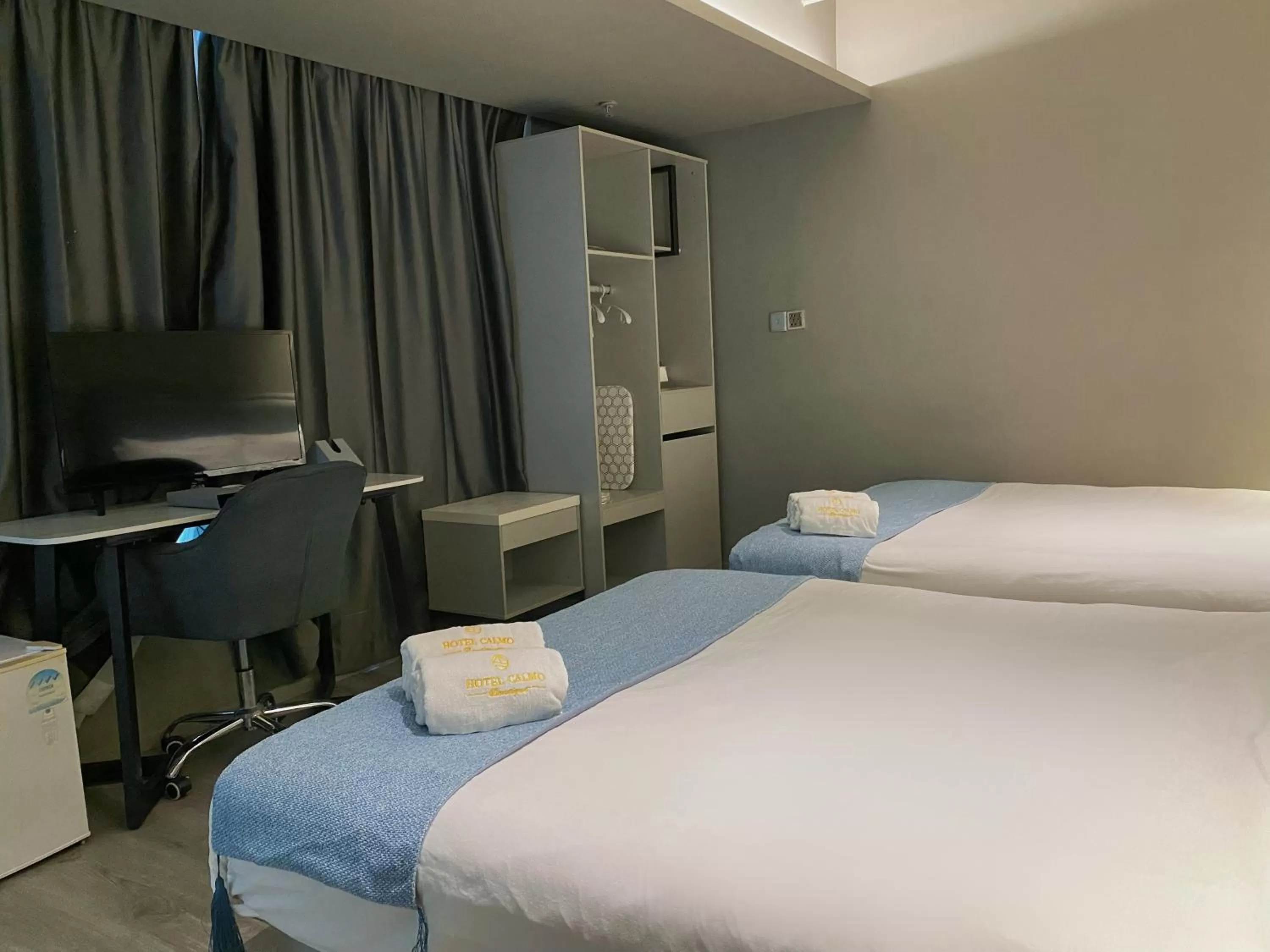 Bed in Hotel Calmo Bugis