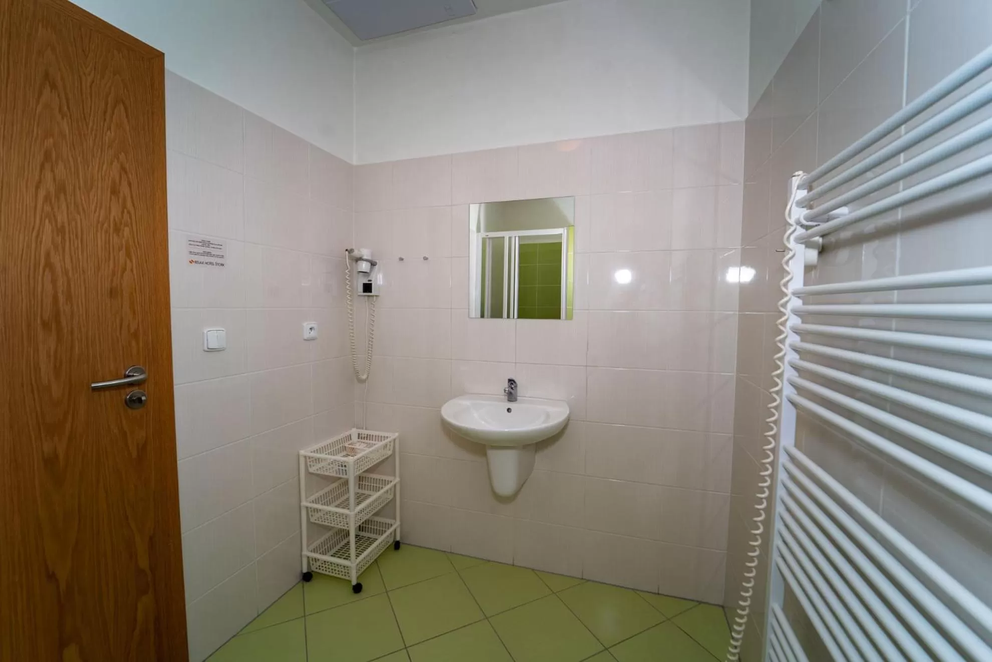 Bathroom in Relax Hotel Stork