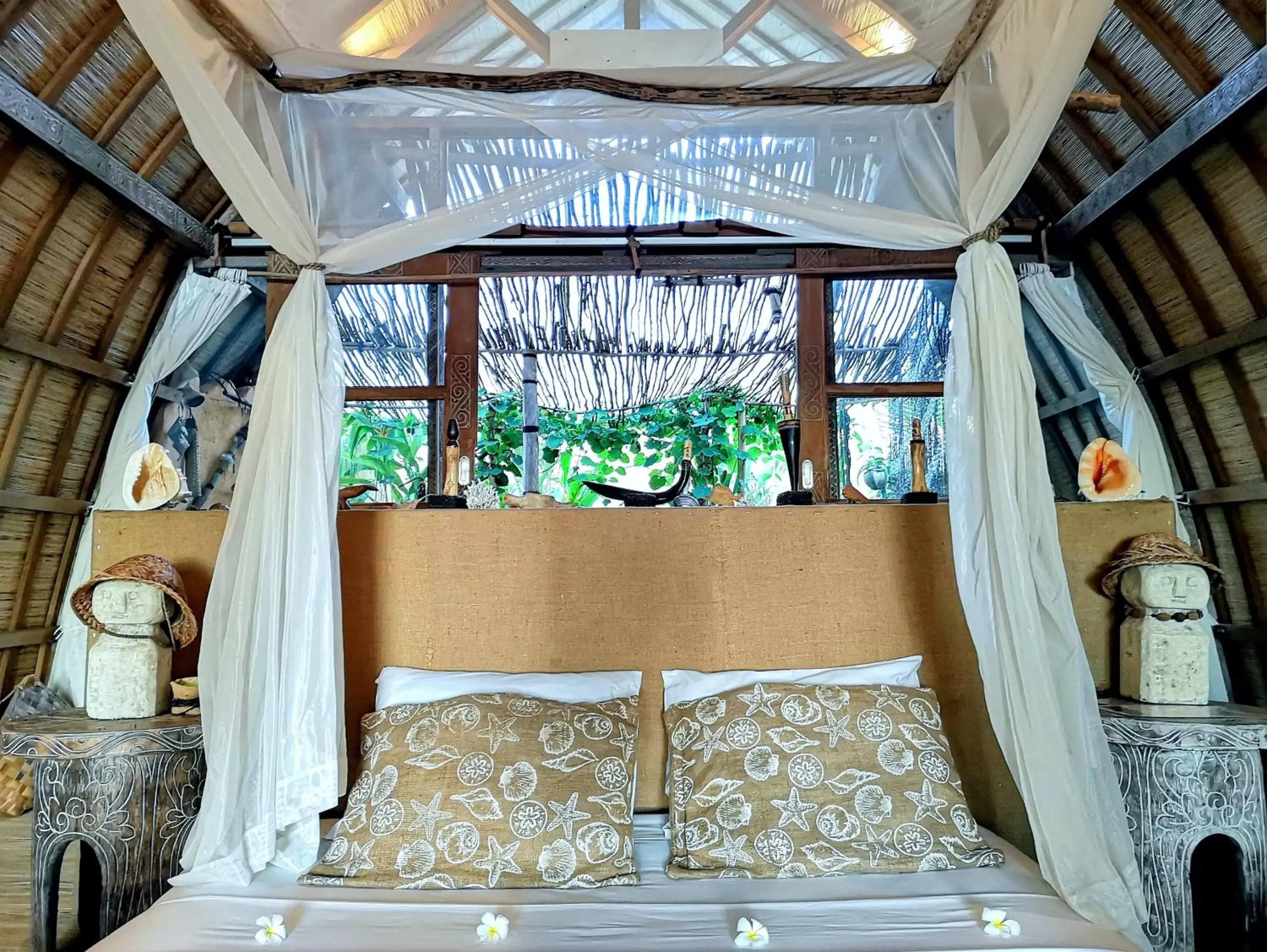 Bed in Coconut Garden Beach Resort
