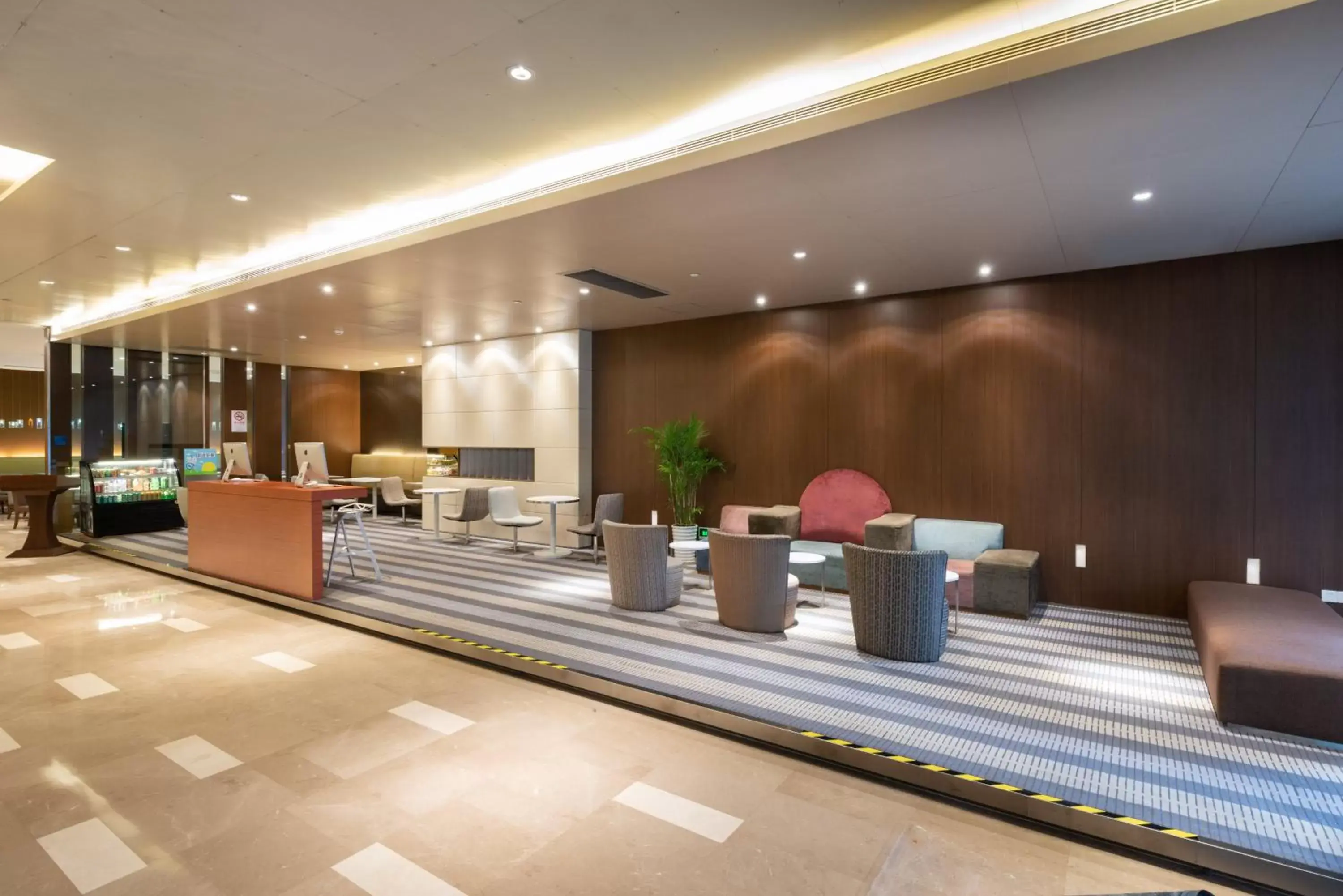 Property building, Lobby/Reception in Holiday Inn Express Shanghai Jinsha, an IHG Hotel