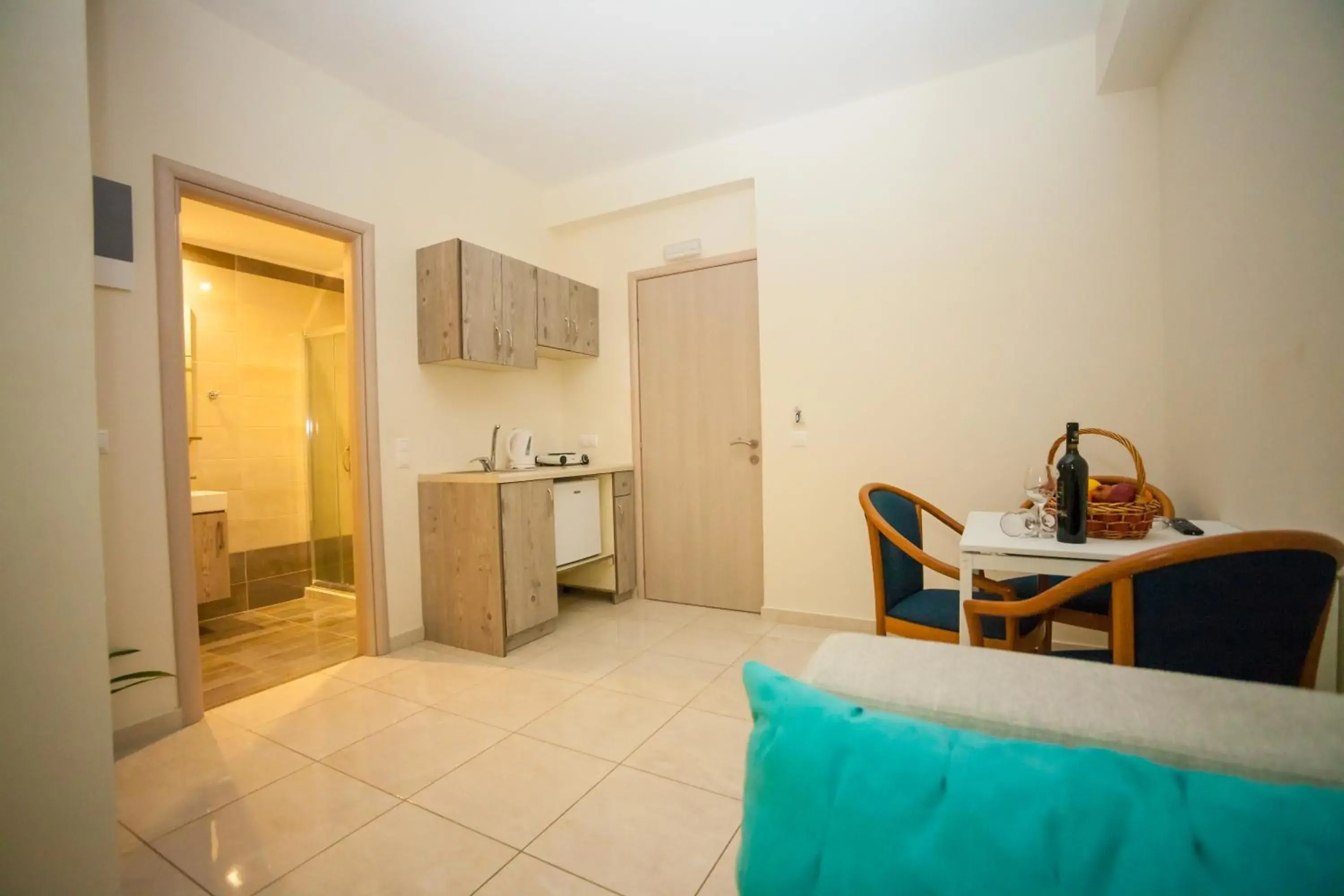 Kitchen or kitchenette, Seating Area in Elounda Water Park Residence Hotel