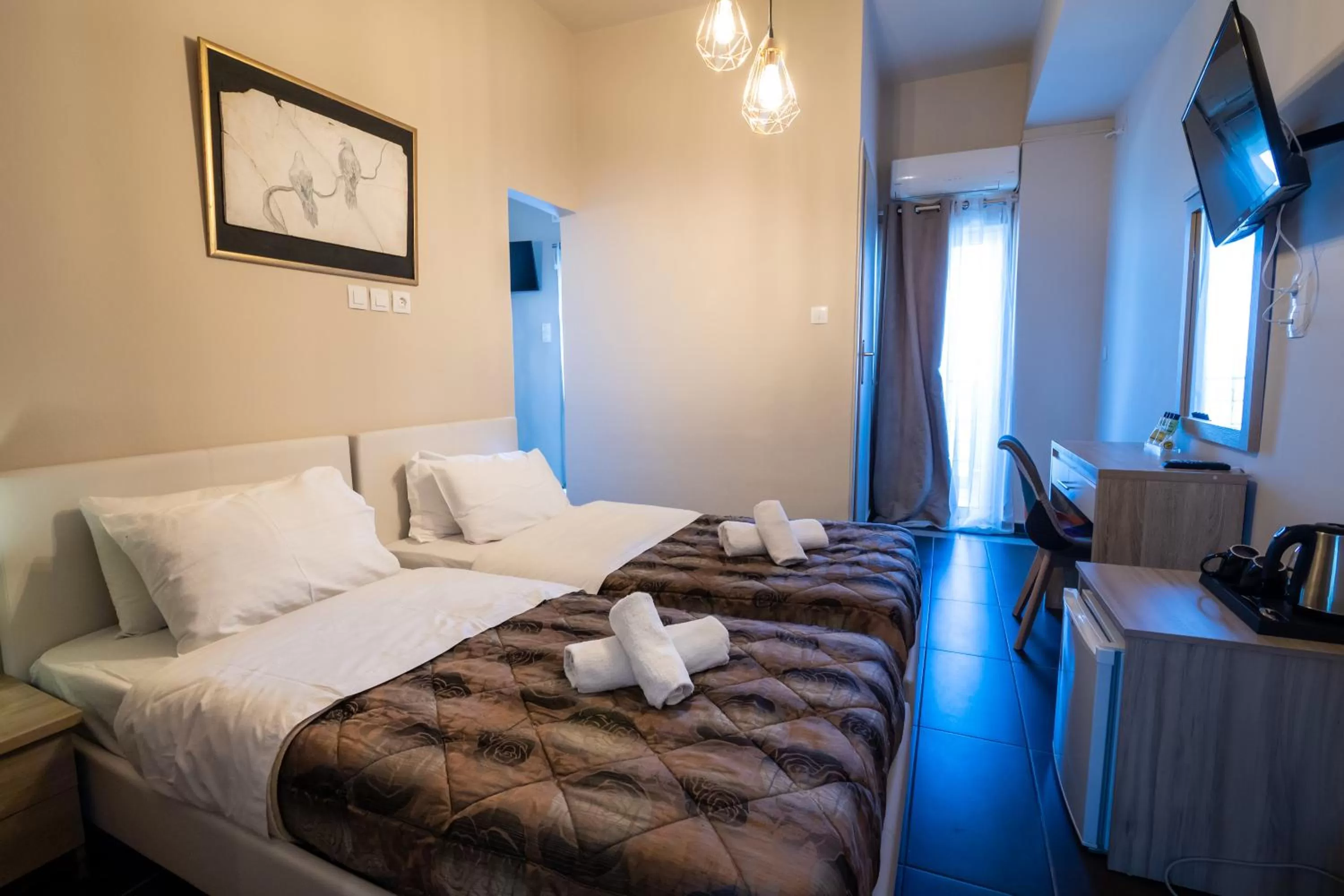 Bed in Votsalakia Hotel & Luxury Apartments