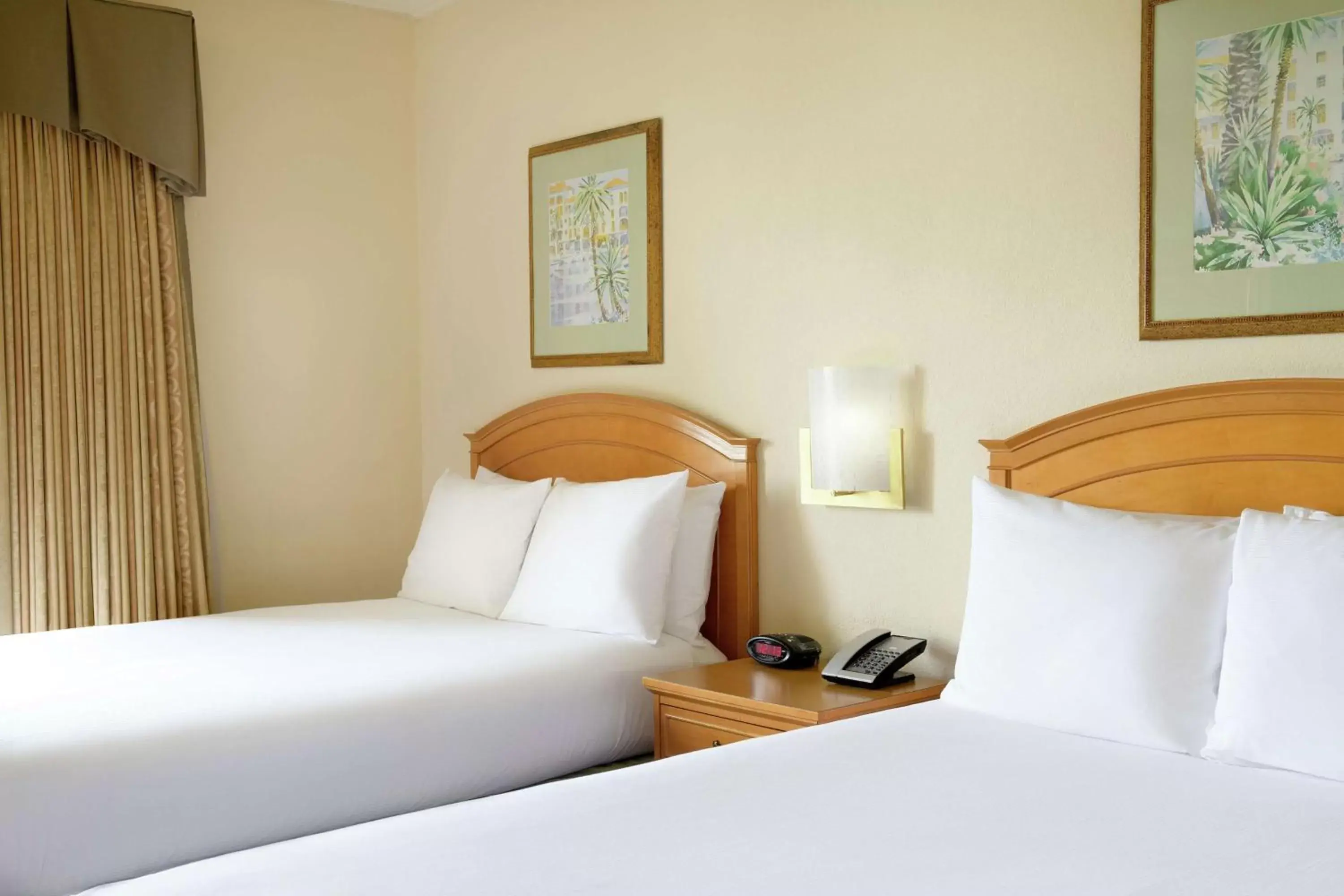 Bed in Hilton Boca Raton Suites