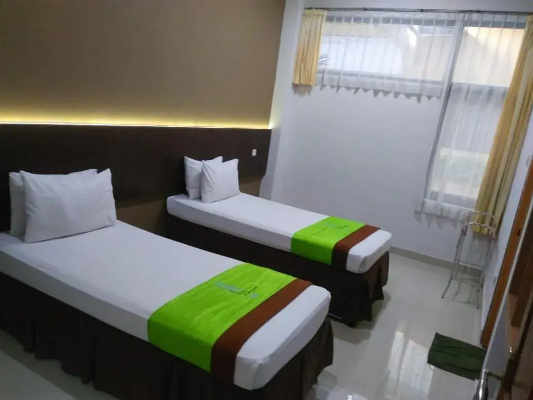 Bed in Hotel Bumi Makmur Indah Lembang