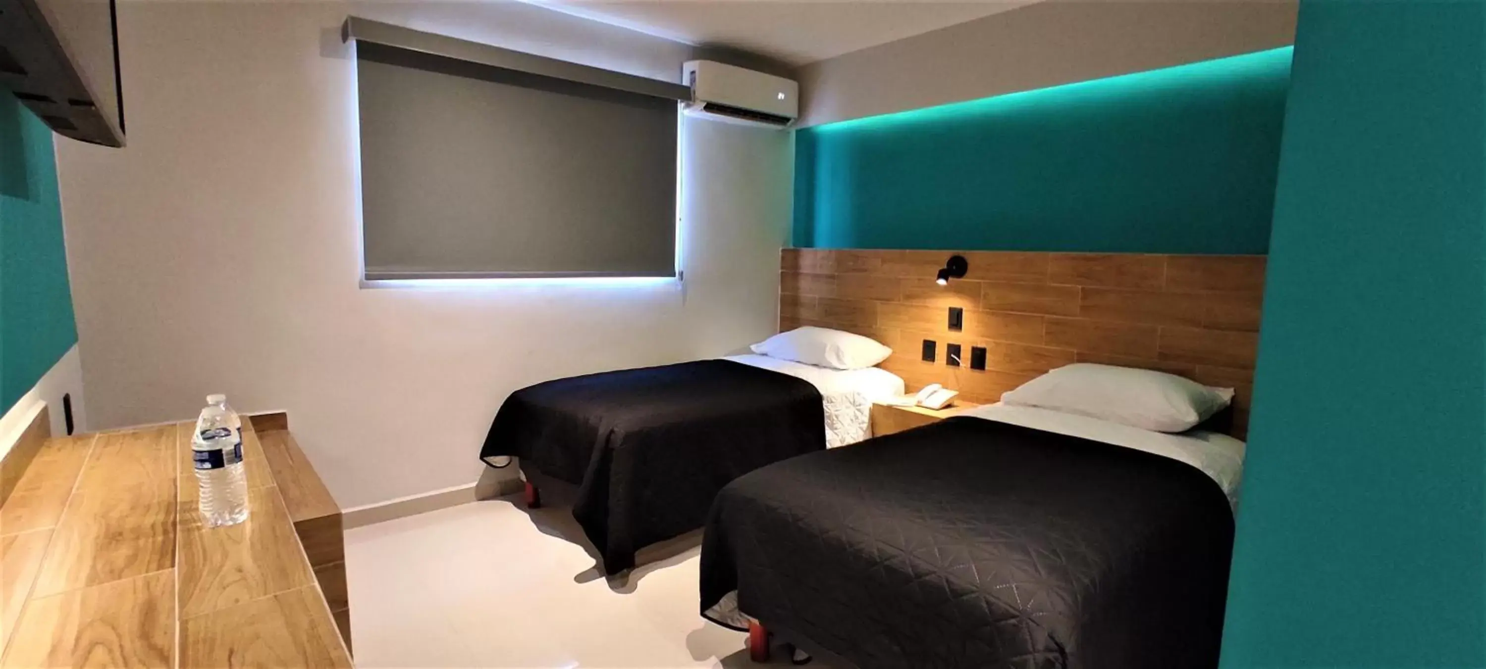Bed in Hotel Kavia Mazatlán