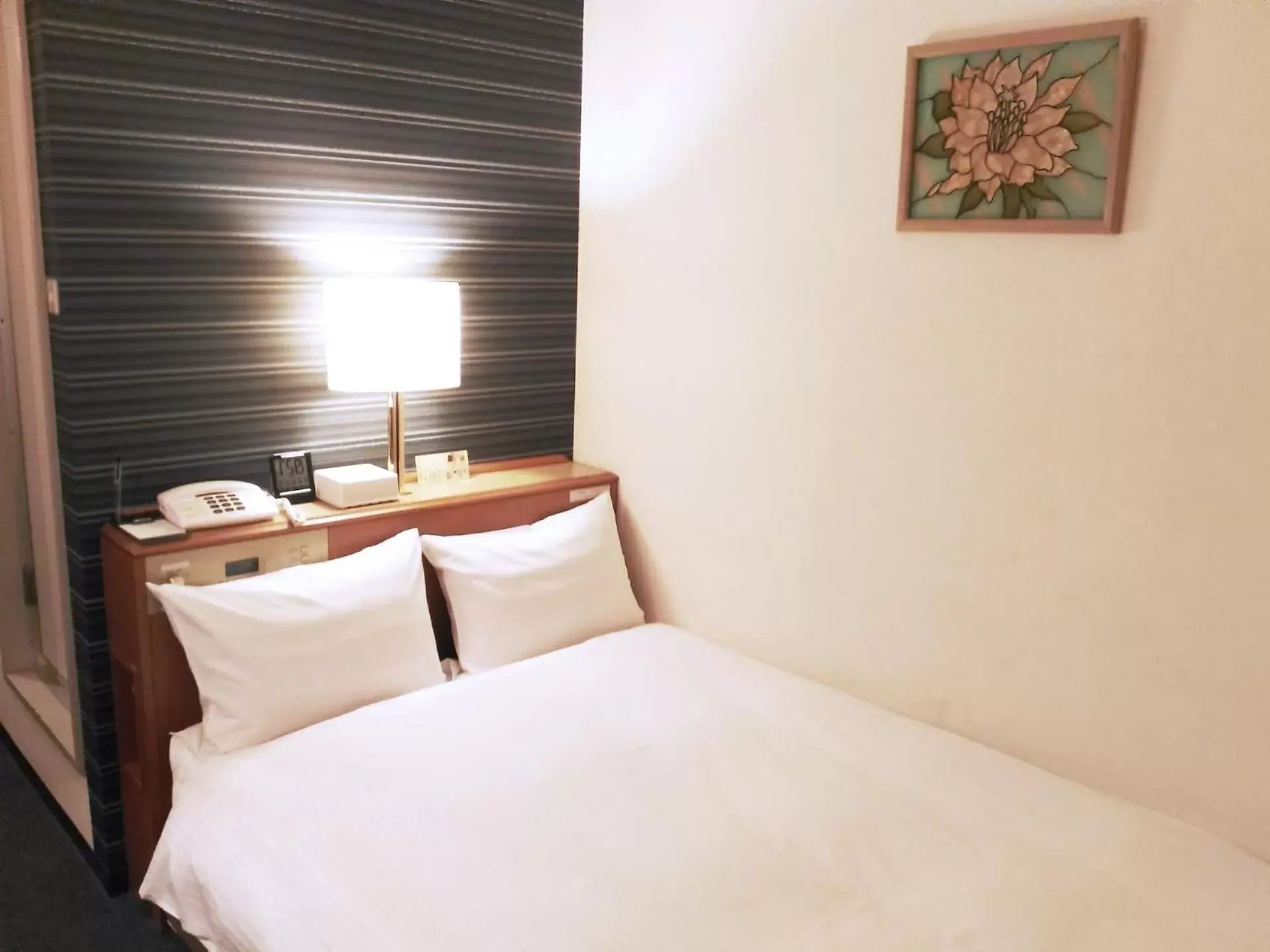 Bed in Smile Hotel Towada