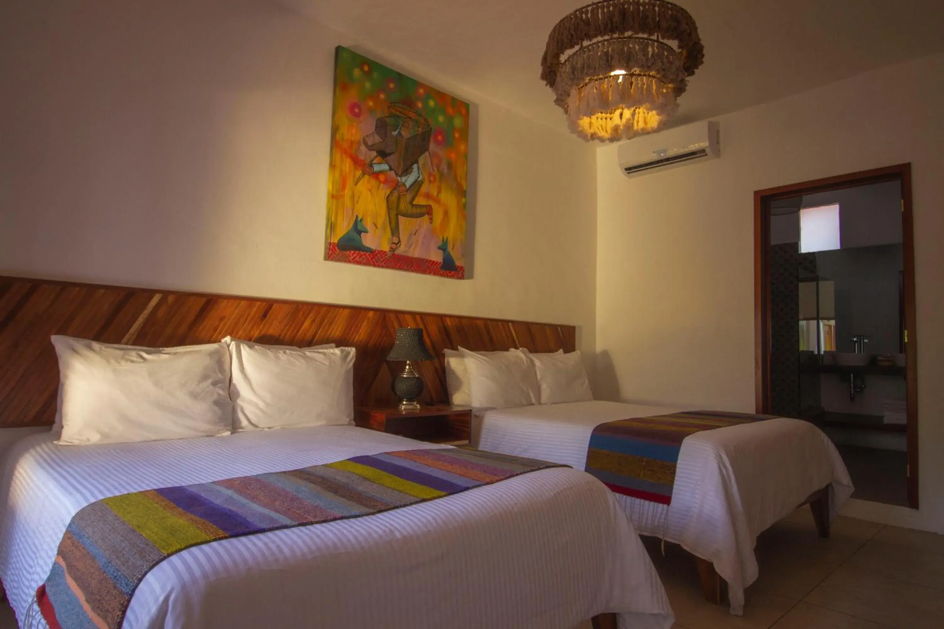 Bed in NaNa Vida Hotel Oaxaca