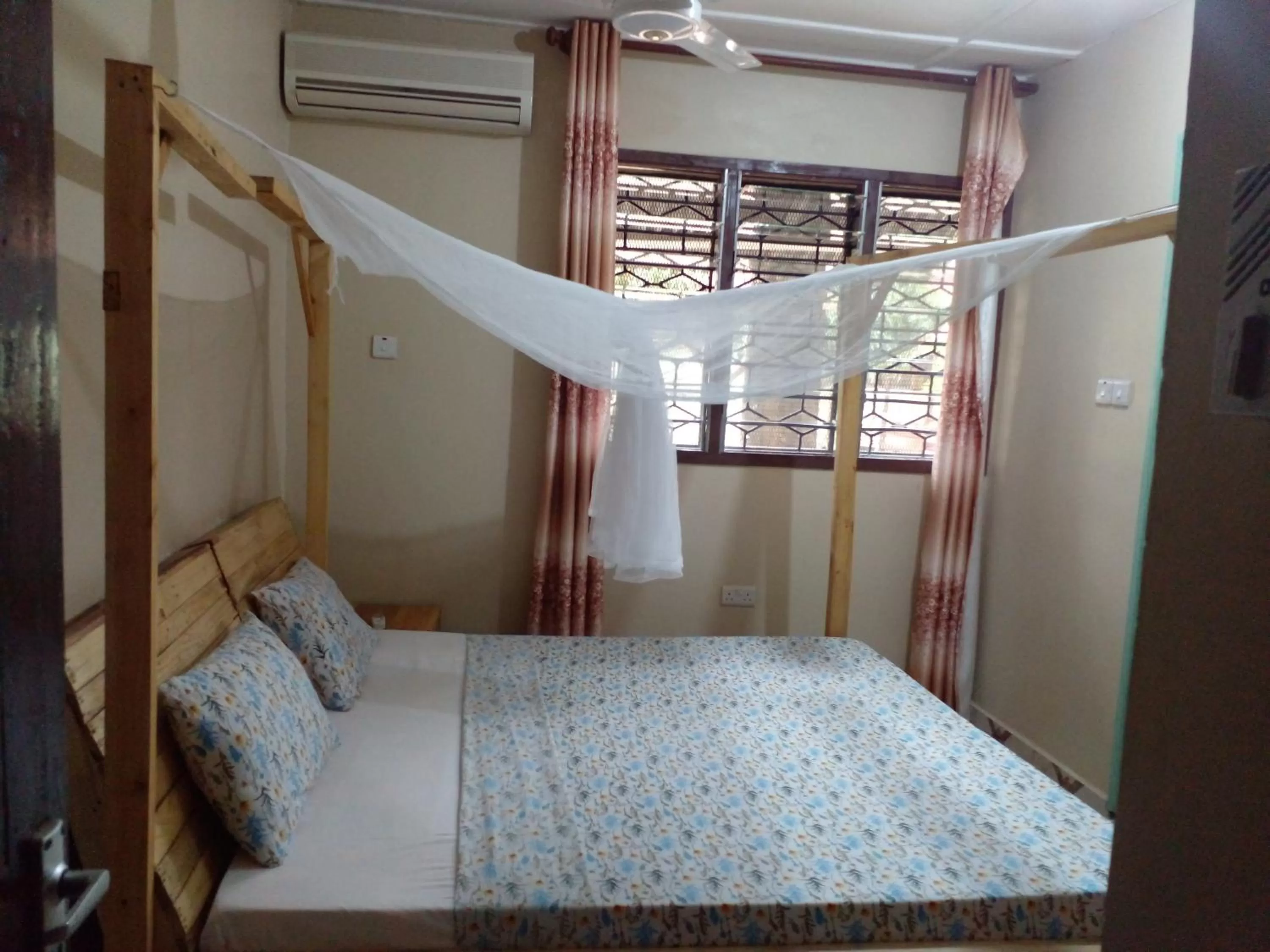 Photo of the whole room, Bed in L&J Modern Backpackers Kinondoni