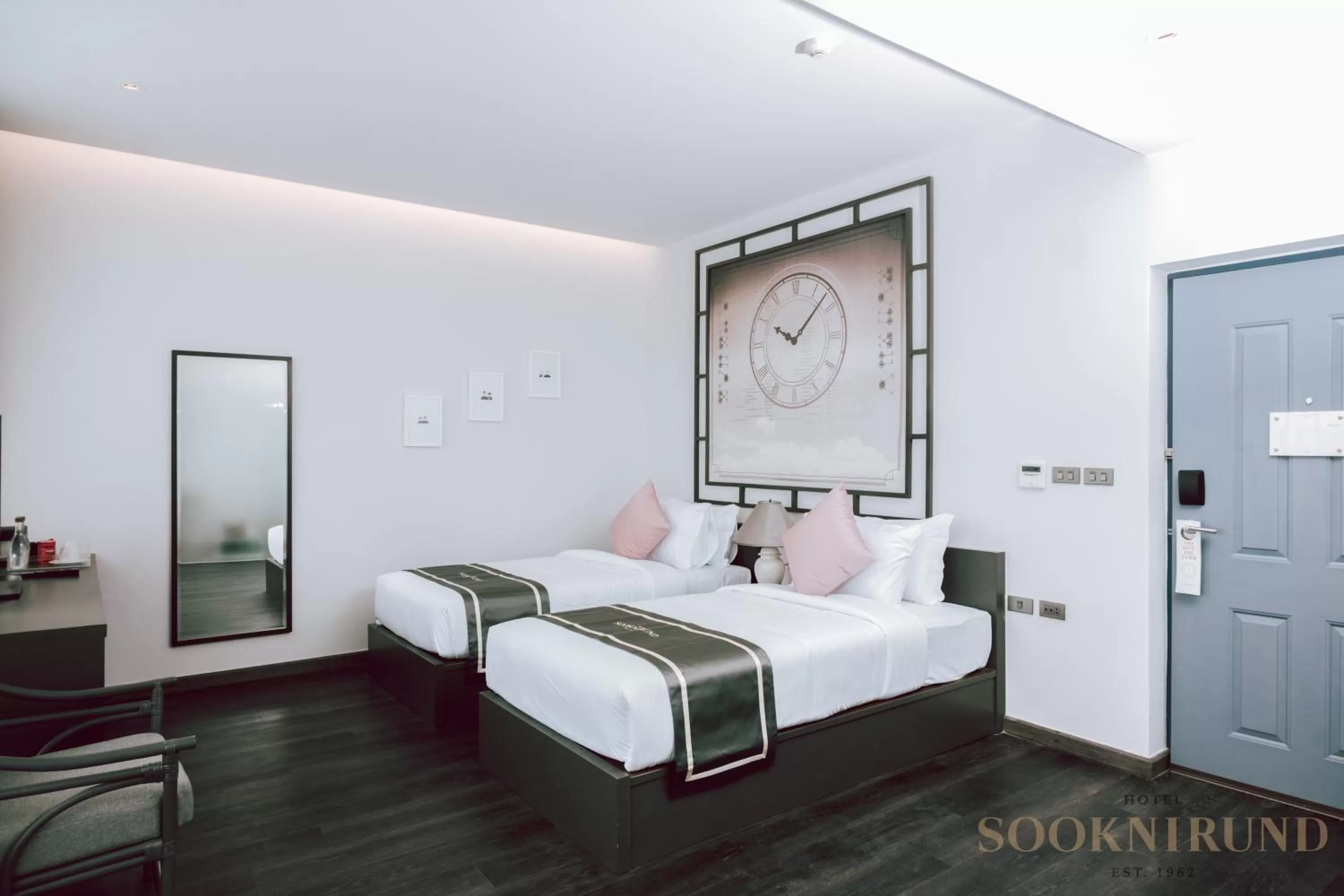 Bed in SOOKNIRUND HOTEL