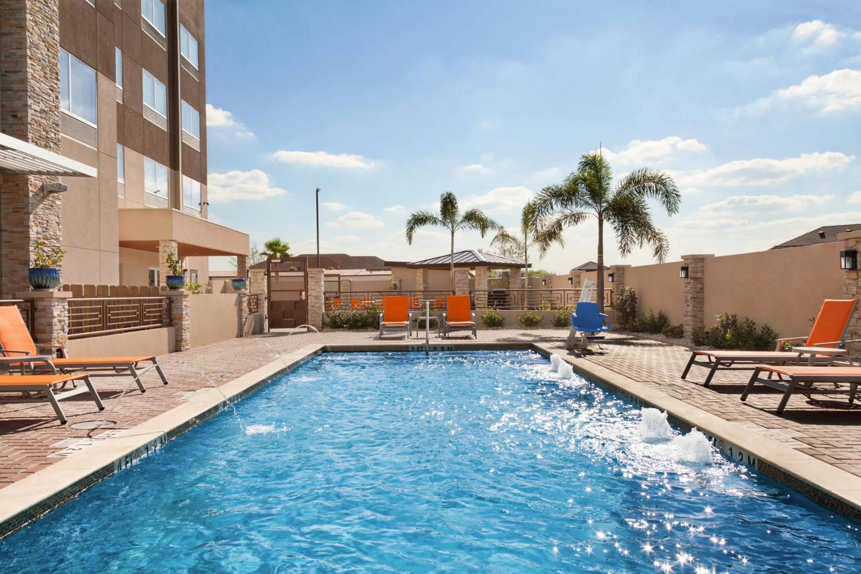 Swimming pool in Holiday Inn Express & Suites Edinburg- Mcallen Area, an IHG Hotel