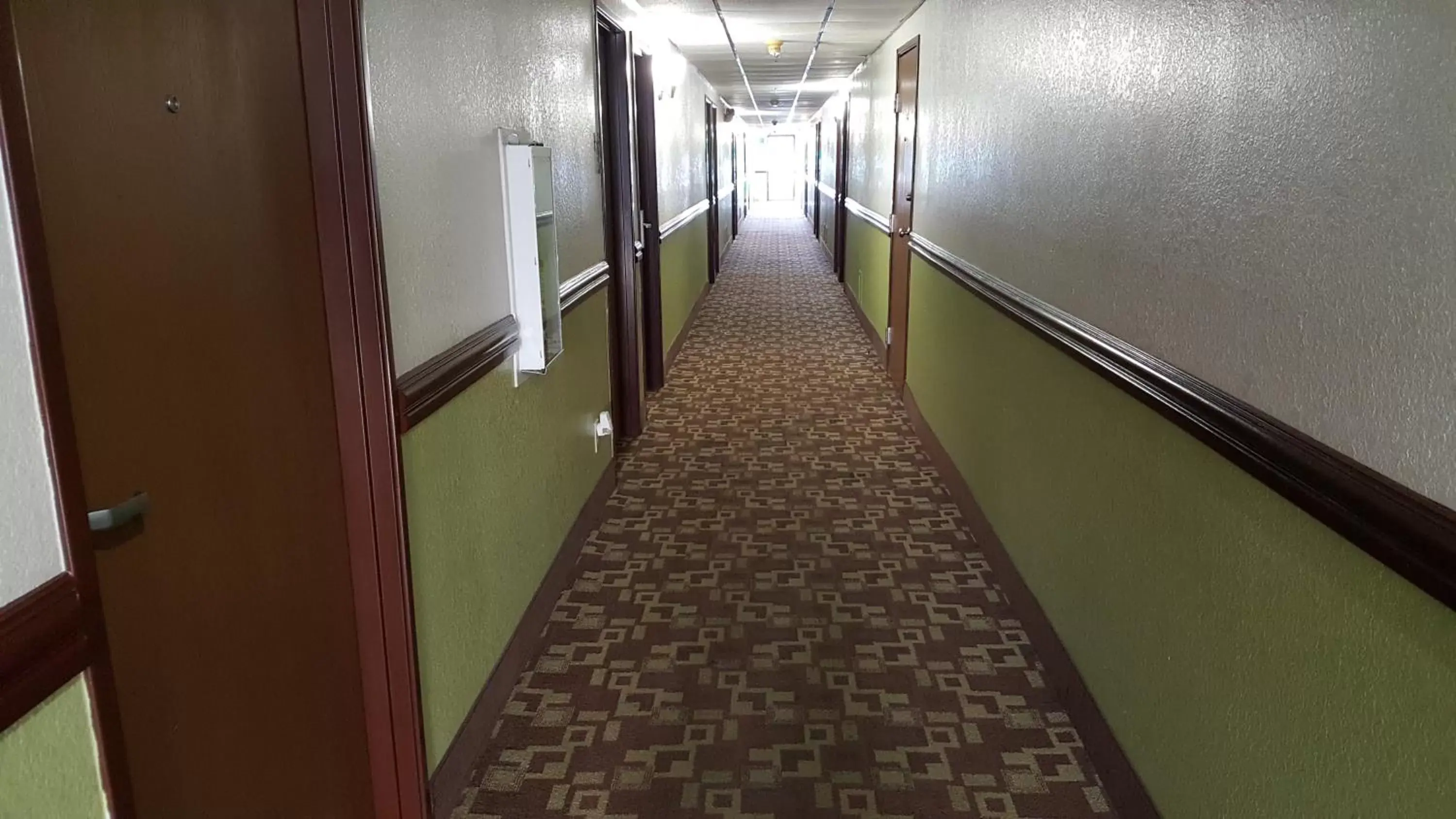 Property building in Super 8 by Wyndham Harlingen TX Property building in Super 8 by Wyndham Harlingen TX