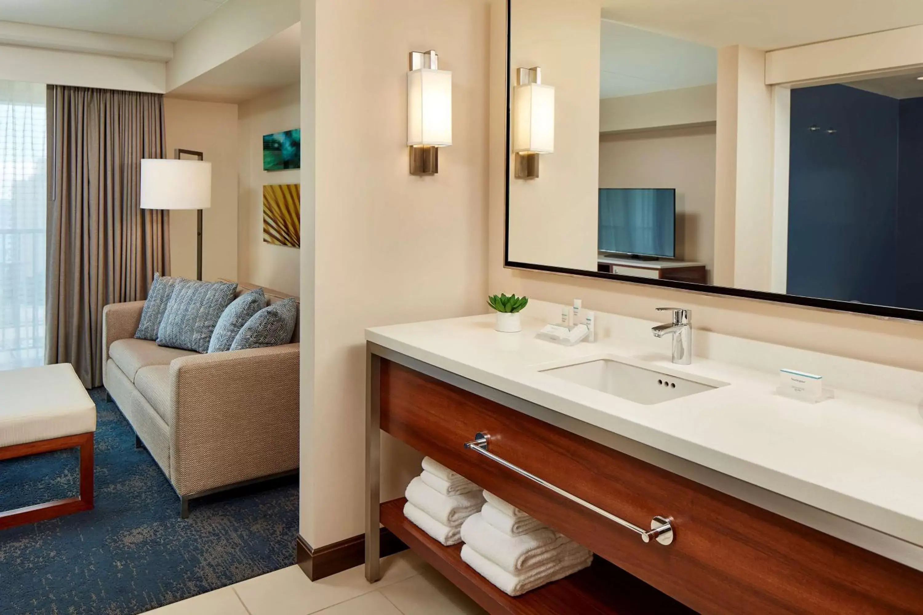 Living room, Bathroom in Hilton Garden Inn Waikiki Beach