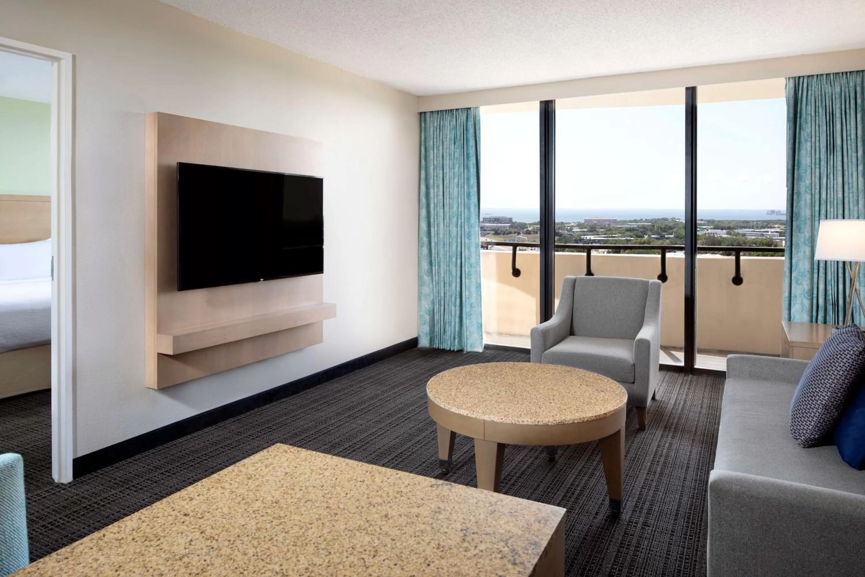 Living room, Bed in Embassy Suites by Hilton Tampa Airport Westshore
