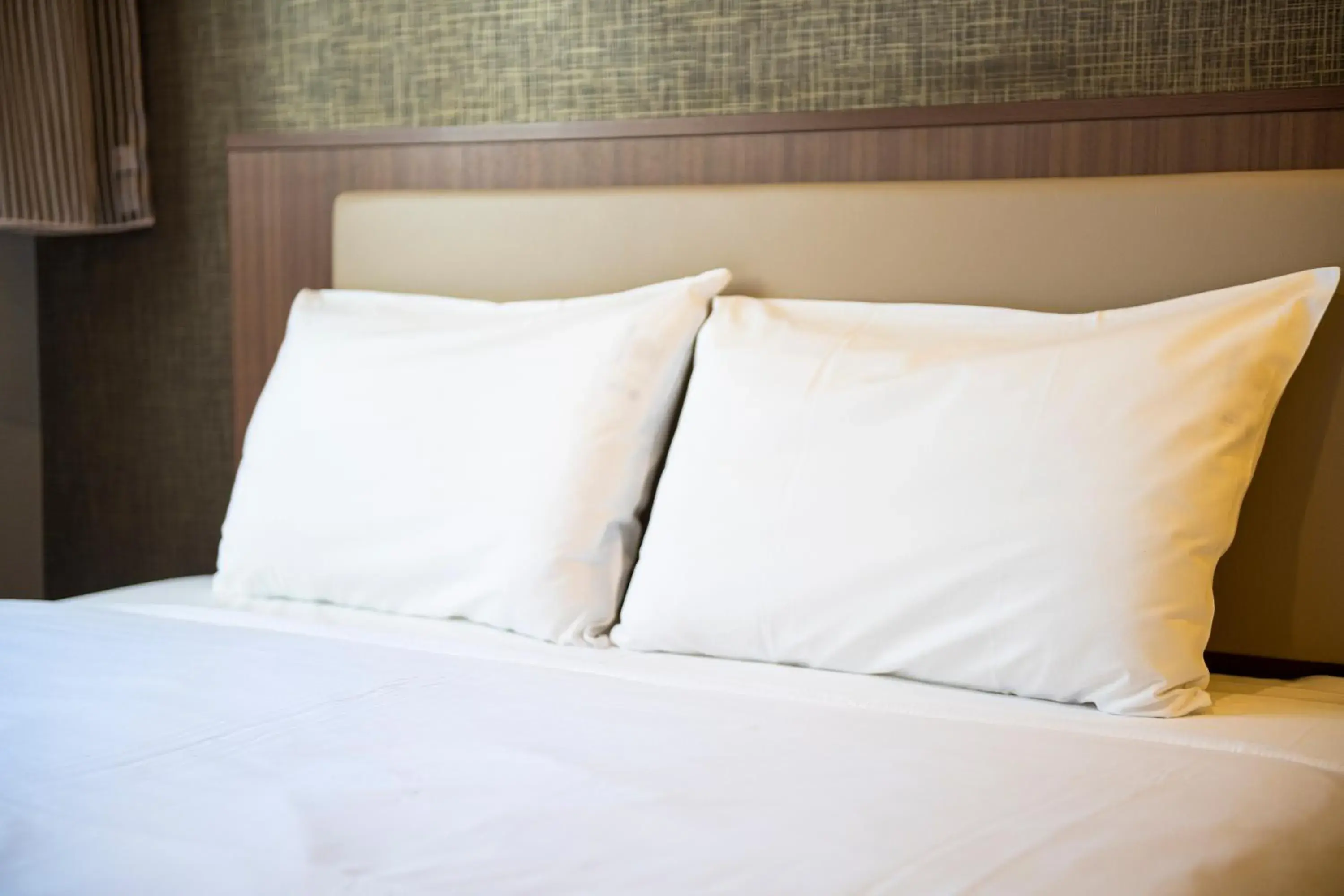 Bed in KOKO HOTEL Ginza-1chome
