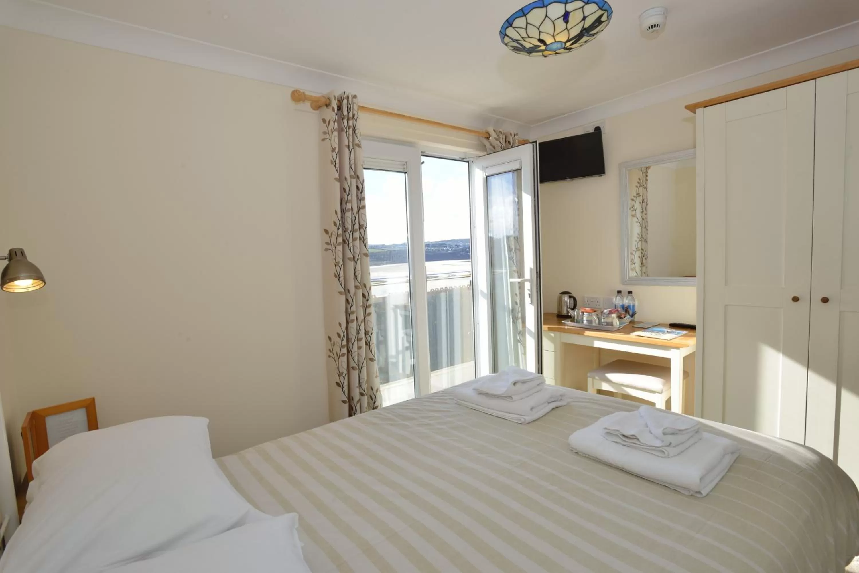 Bed in The Penellen guest accommodation room only