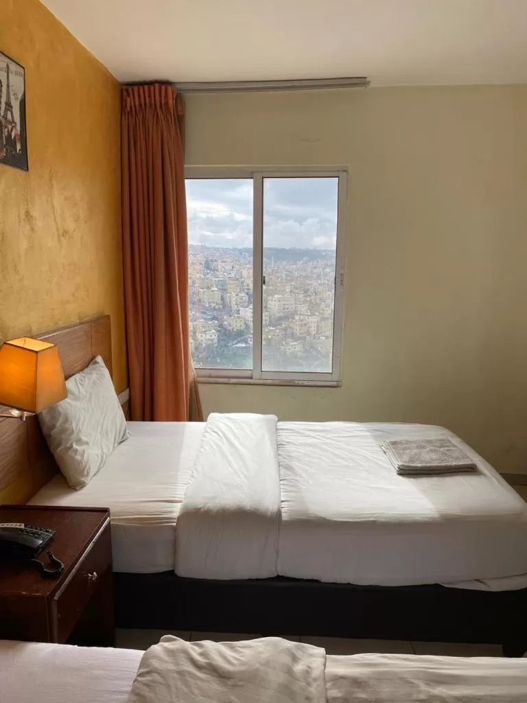 Bed in Zaina Plaza Hotel