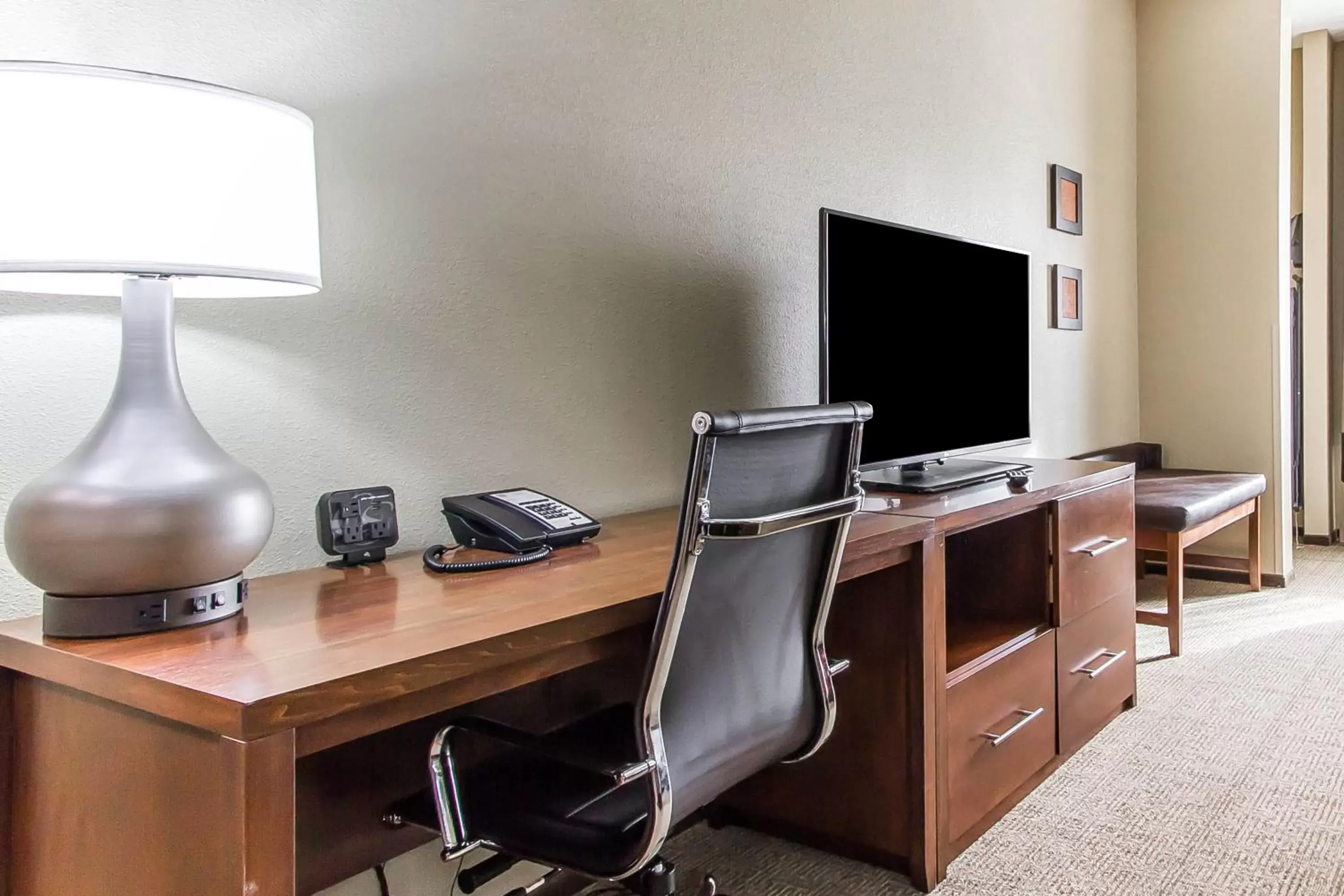 Photo of the whole room, TV/Entertainment Center in Comfort Suites West Omaha