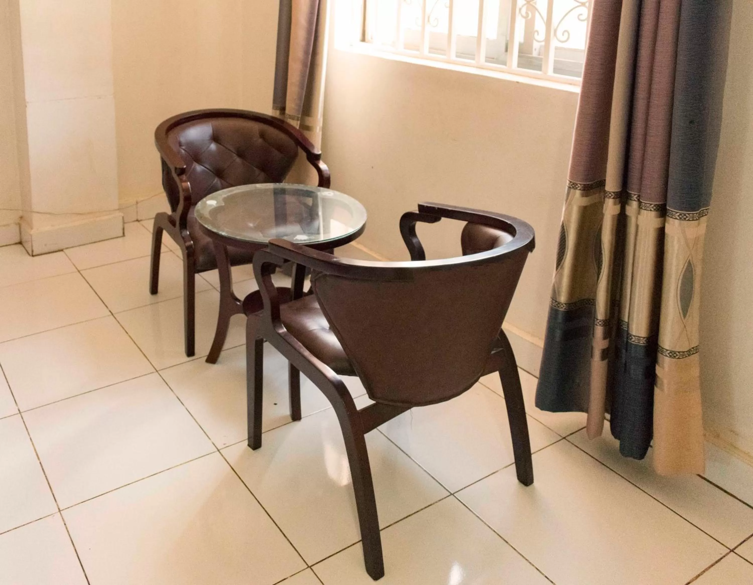 Seating area in Sunrise Hotel Kampala