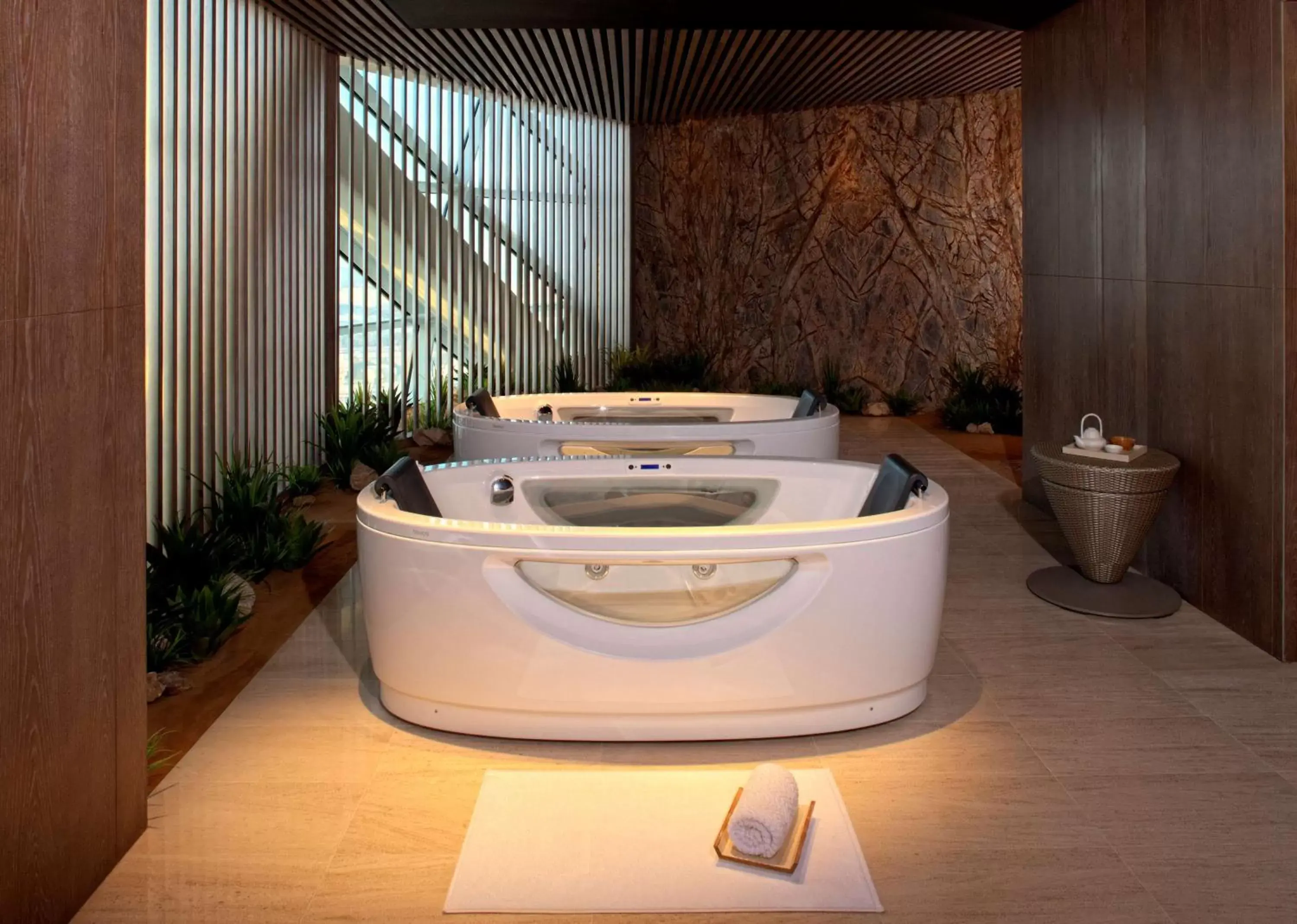 Spa and wellness centre/facilities, Bathroom in Andaz Capital Gate Abu Dhabi - a concept by Hyatt