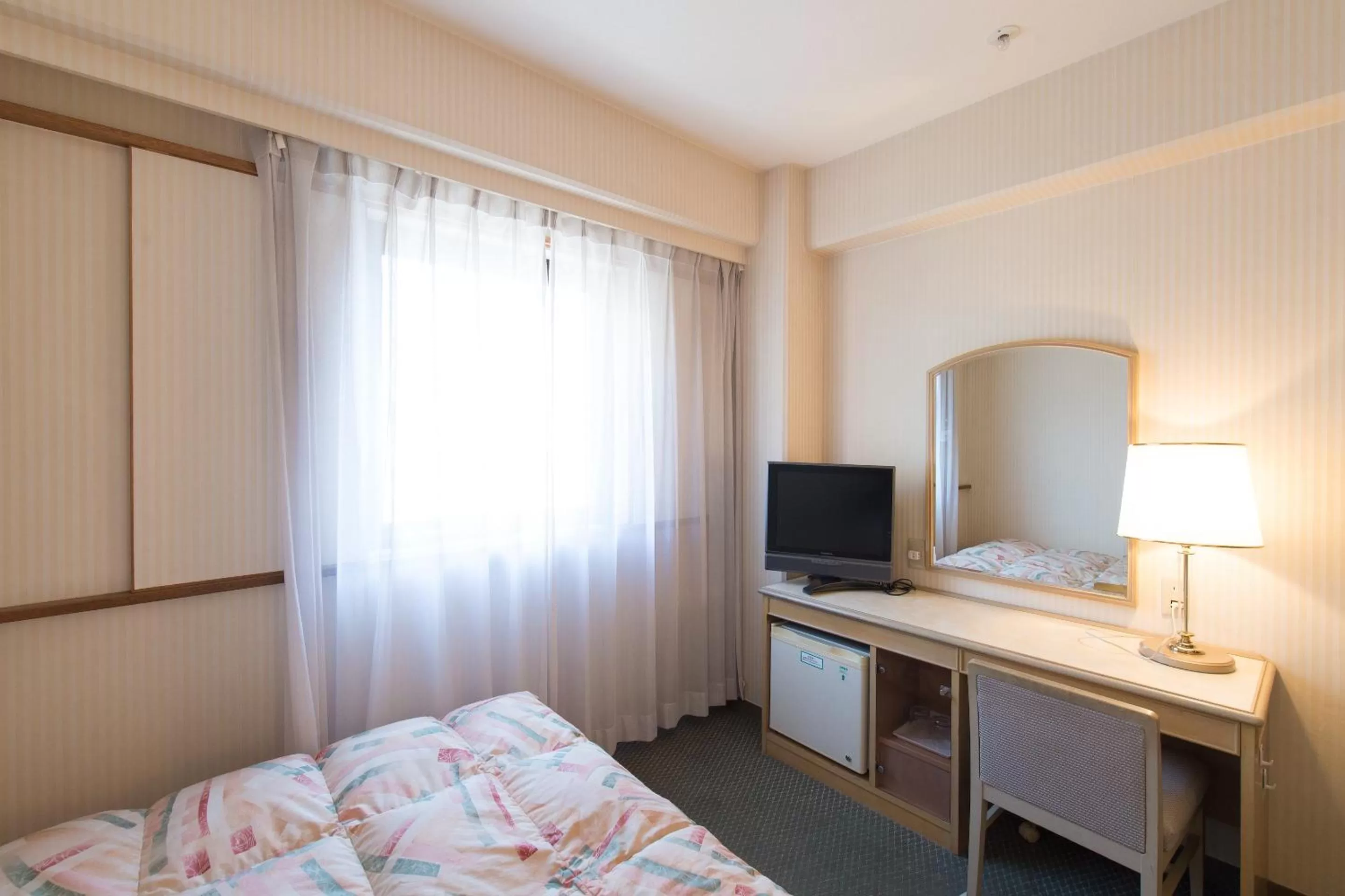 Photo of the whole room, Bed in Tabist Hotel Tetora Kitakyushu