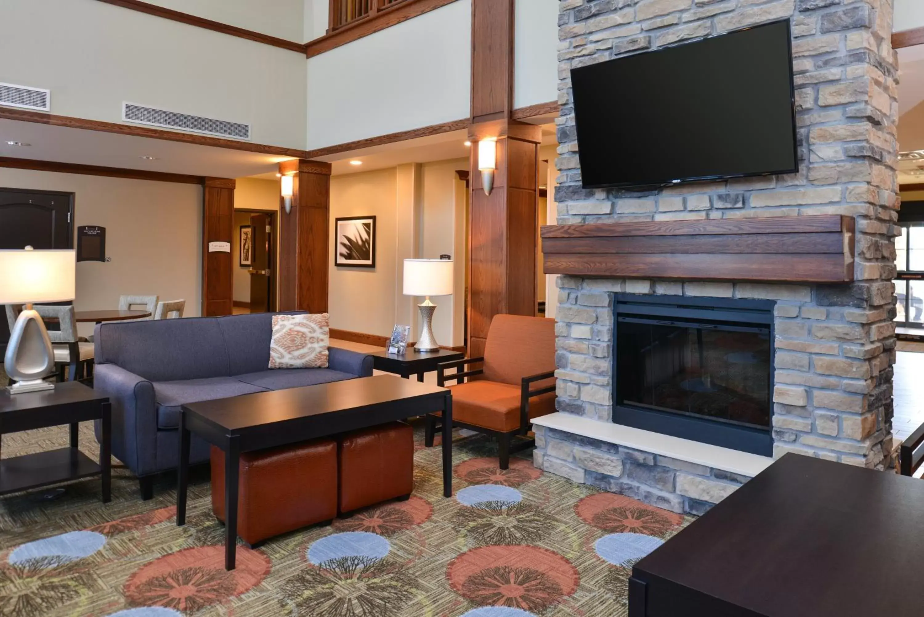 Property building, Seating Area in Staybridge Suites Rochester, an IHG Hotel