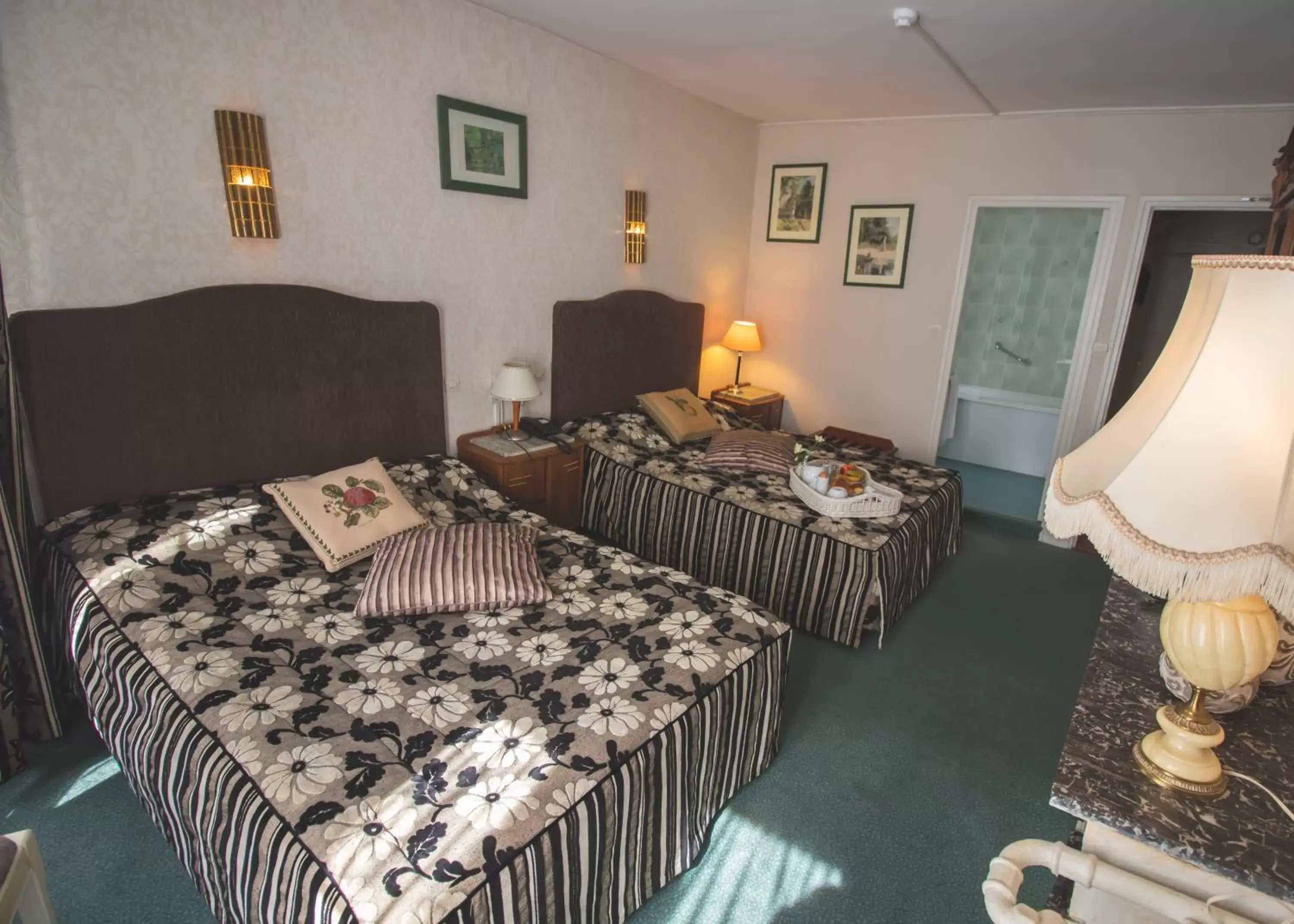 Photo of the whole room, Bed in Hôtel De La Banniere De France