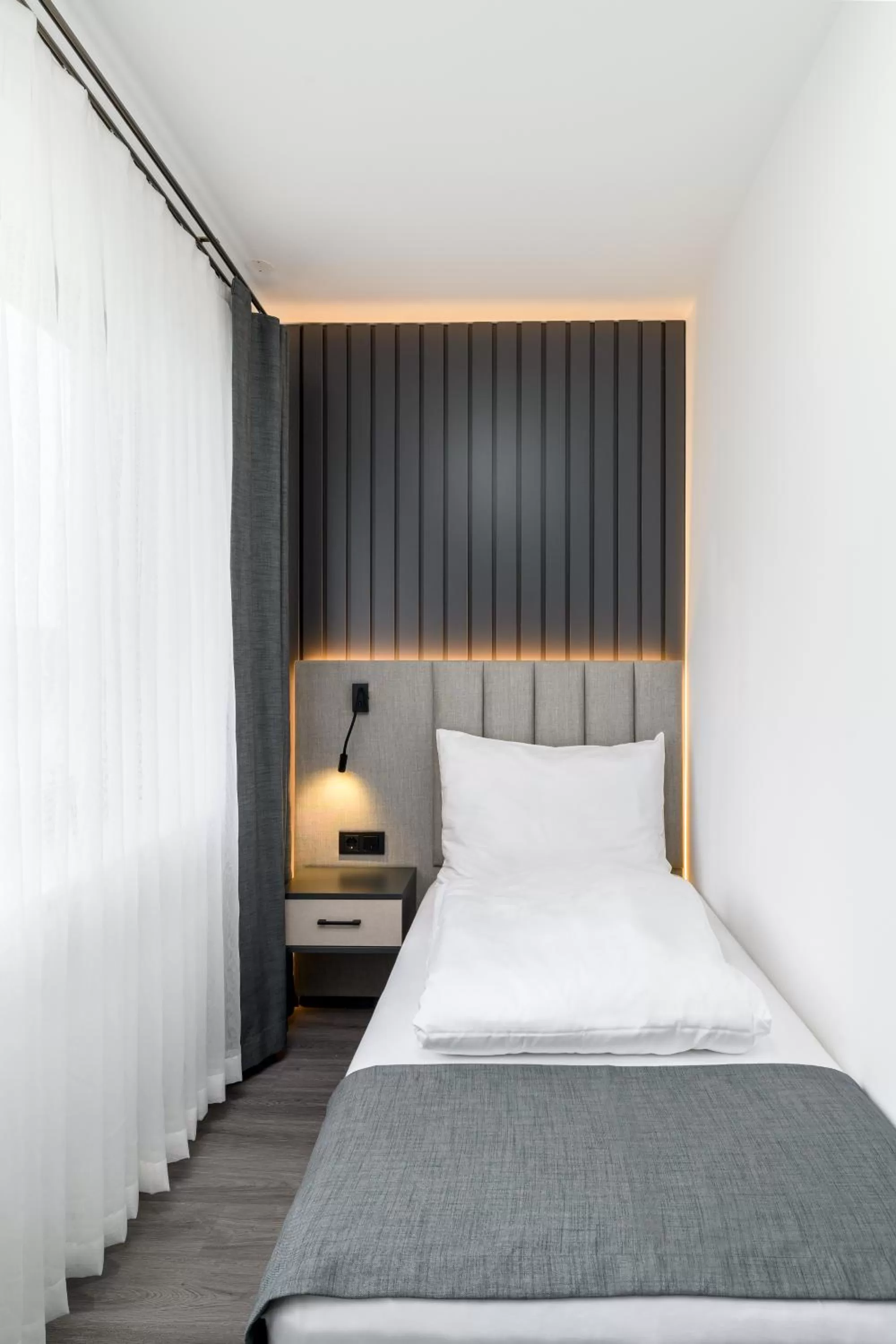 Bed in PARKHOTEL BRAUNAU - 24 Stunden Self Check-IN