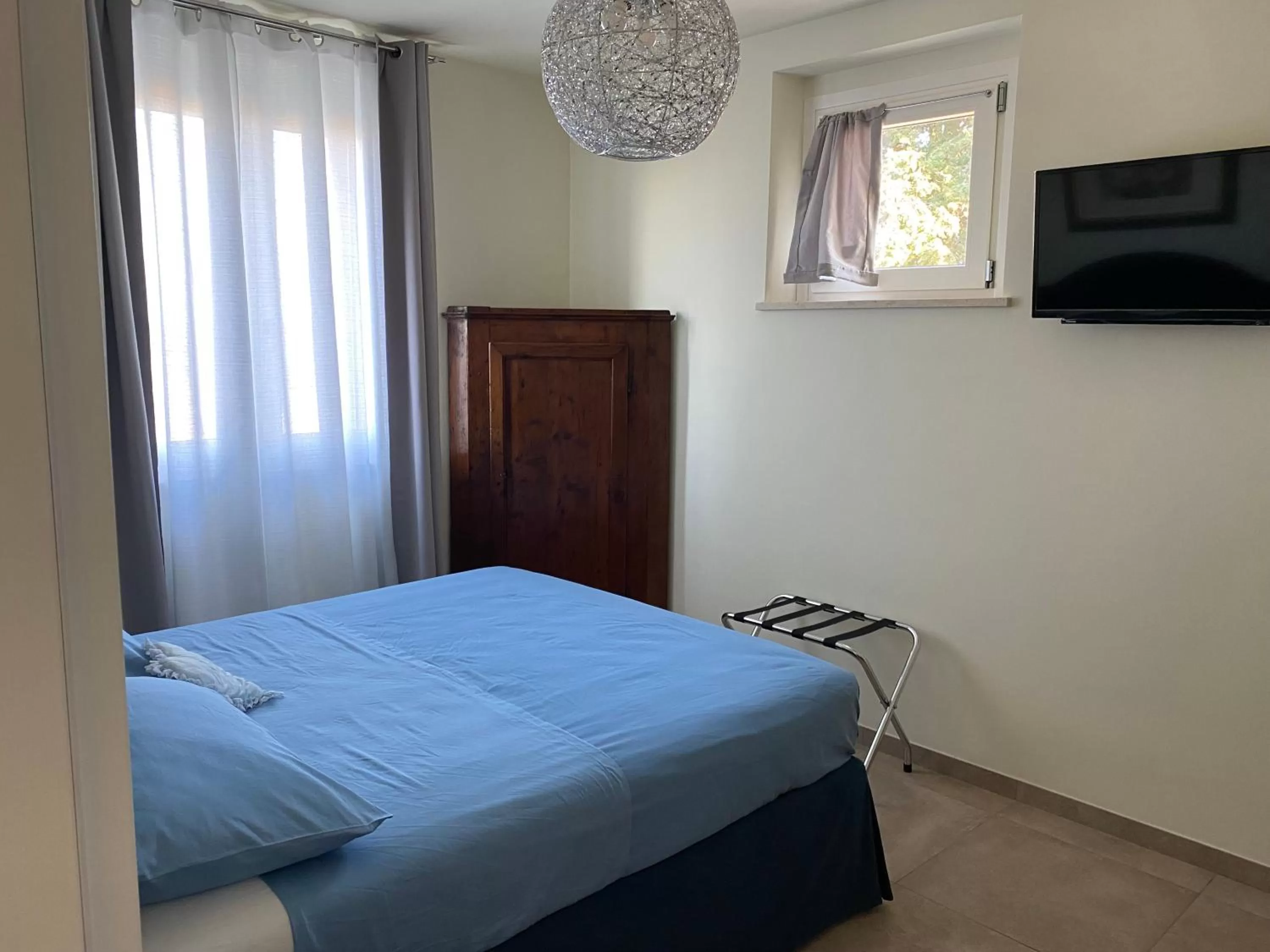 Photo of the whole room, Bed in B&B Il Melograno