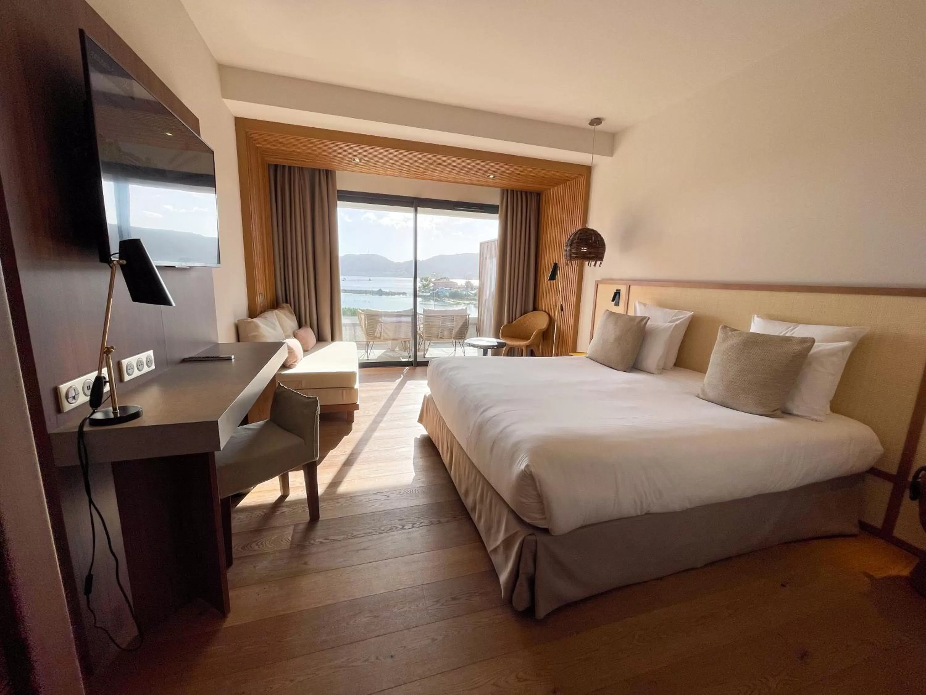 Photo of the whole room, Bed in Golden Tulip Porto-Vecchio