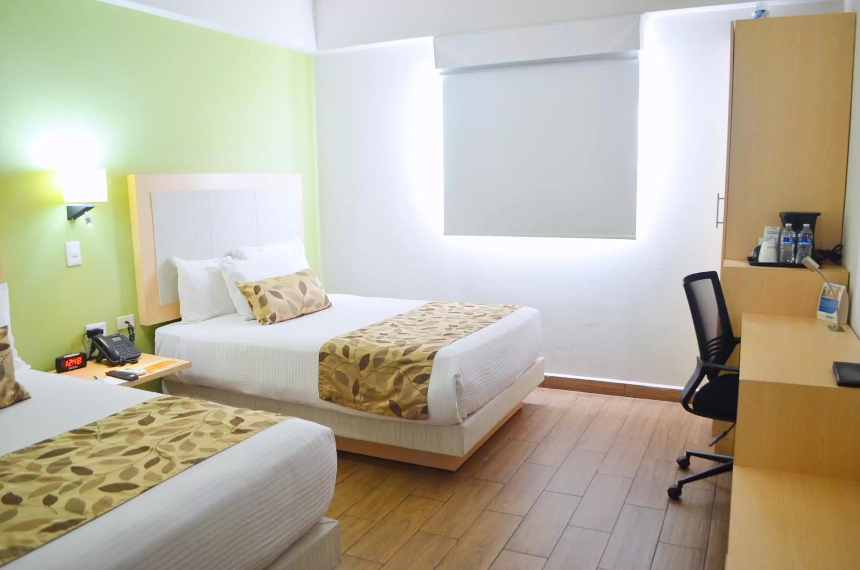 Photo of the whole room, Bed in Sleep Inn Mazatlan