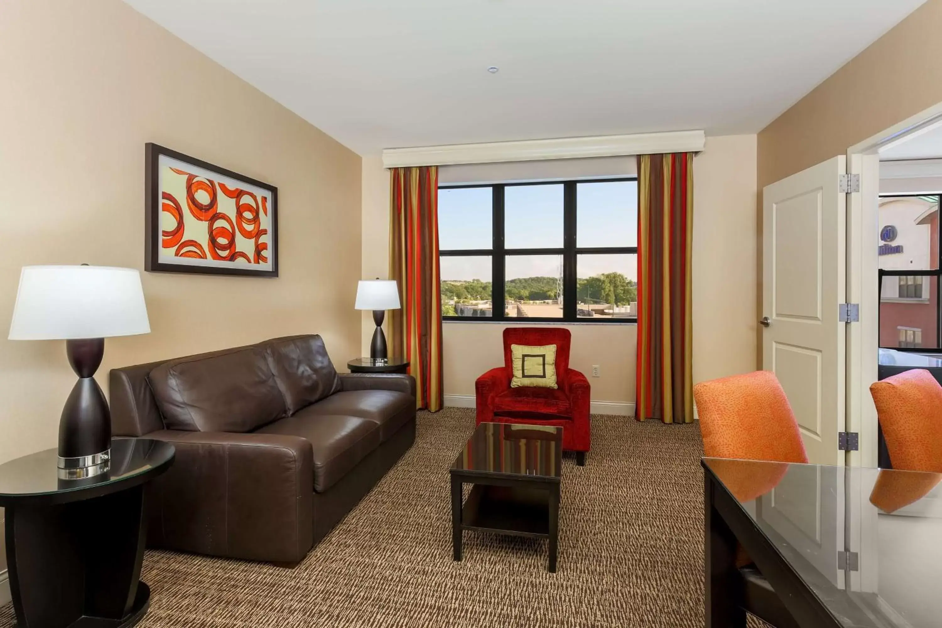 Living room, Seating Area in Hilton Promenade Branson Landing