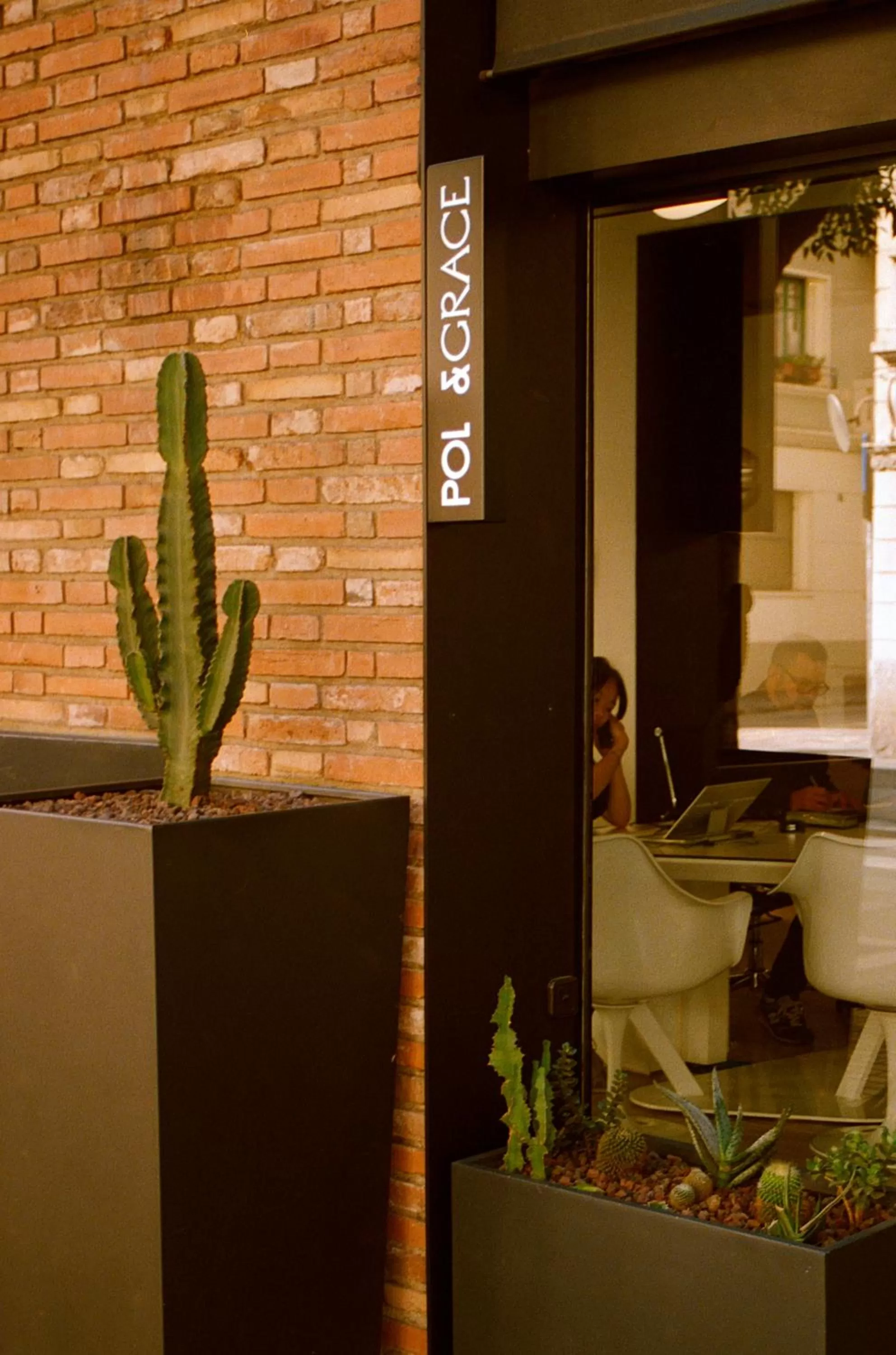 Property logo or sign in Pol & Grace Hotel