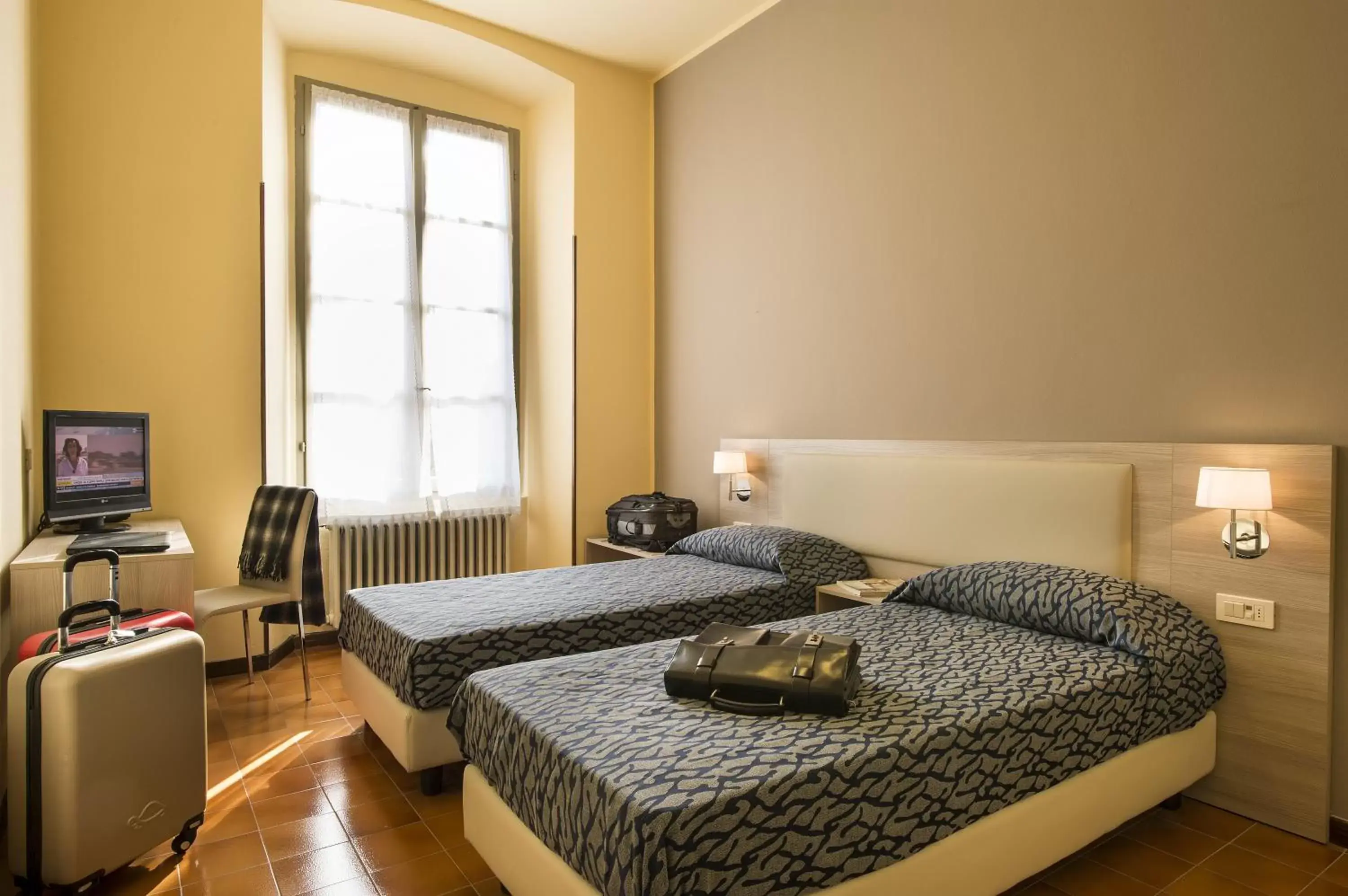 Photo of the whole room, Bed in Centro Paolo VI