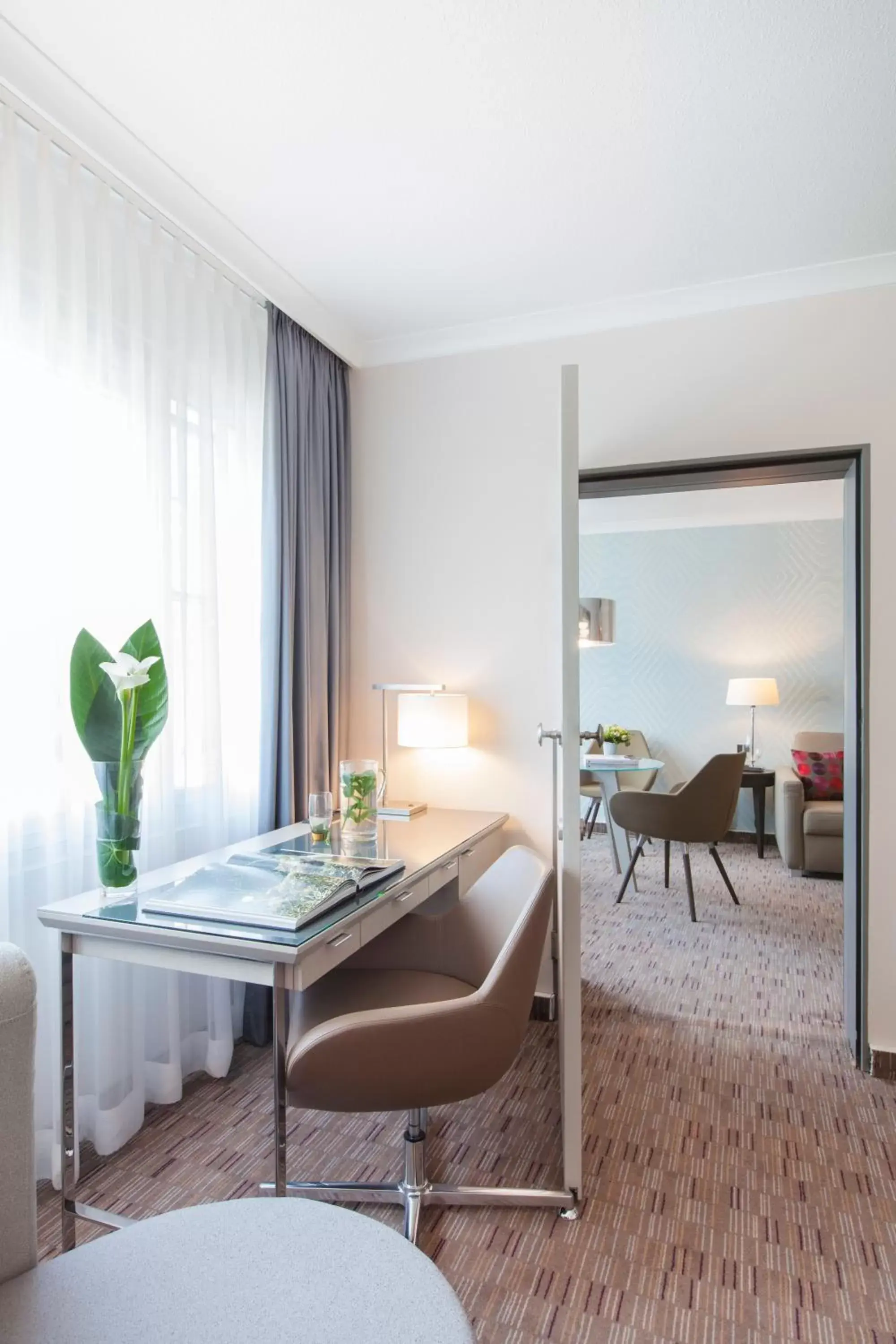 Bedroom, Dining Area in Crowne Plaza Berlin City Centre Ku'damm, an IHG Hotel