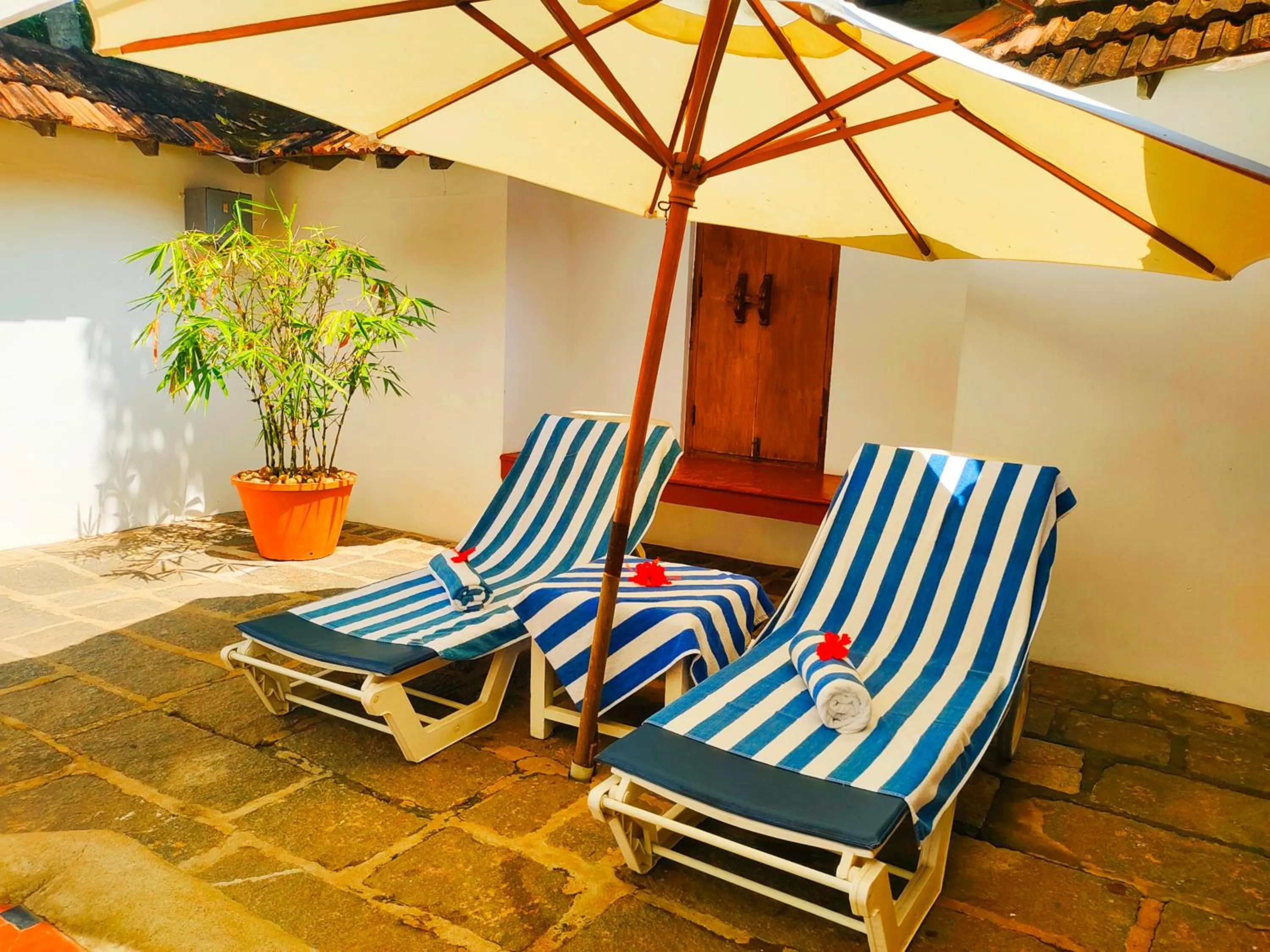 Swimming pool in The Travancore Heritage Beach Resort