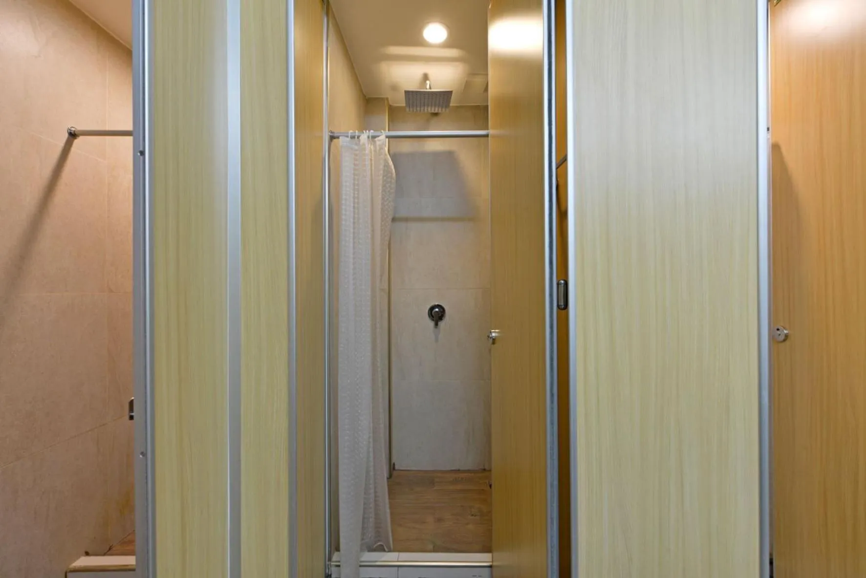 Shower in StayAt Bedever Bangkok Hotel