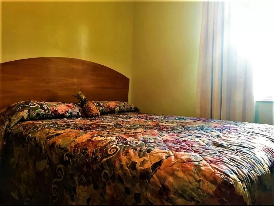 Bed in Gold Coast Family Cottages