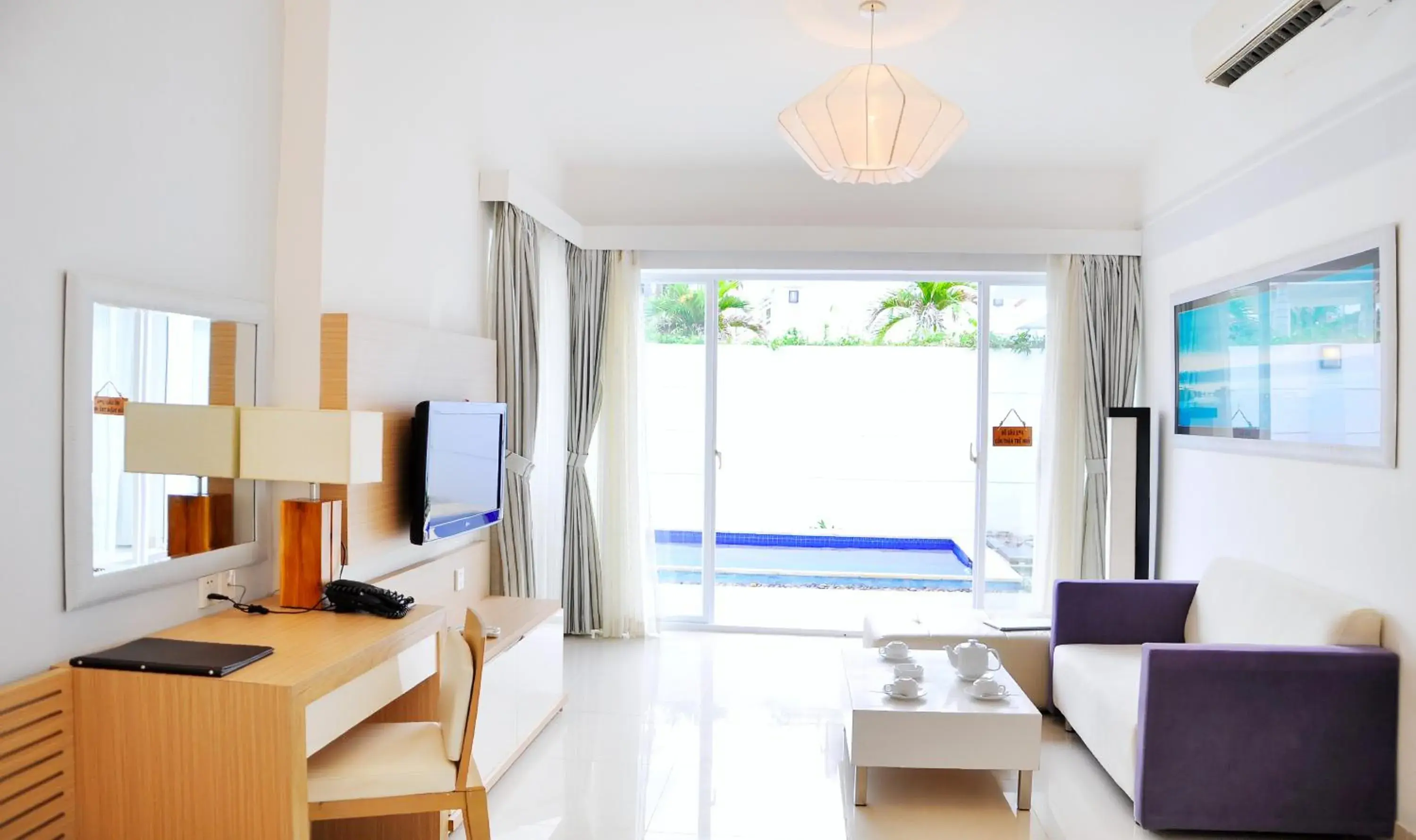 TV and multimedia, Pool View in TTC Resort Ke Ga TV and multimedia, Pool View in TTC Resort Ke Ga