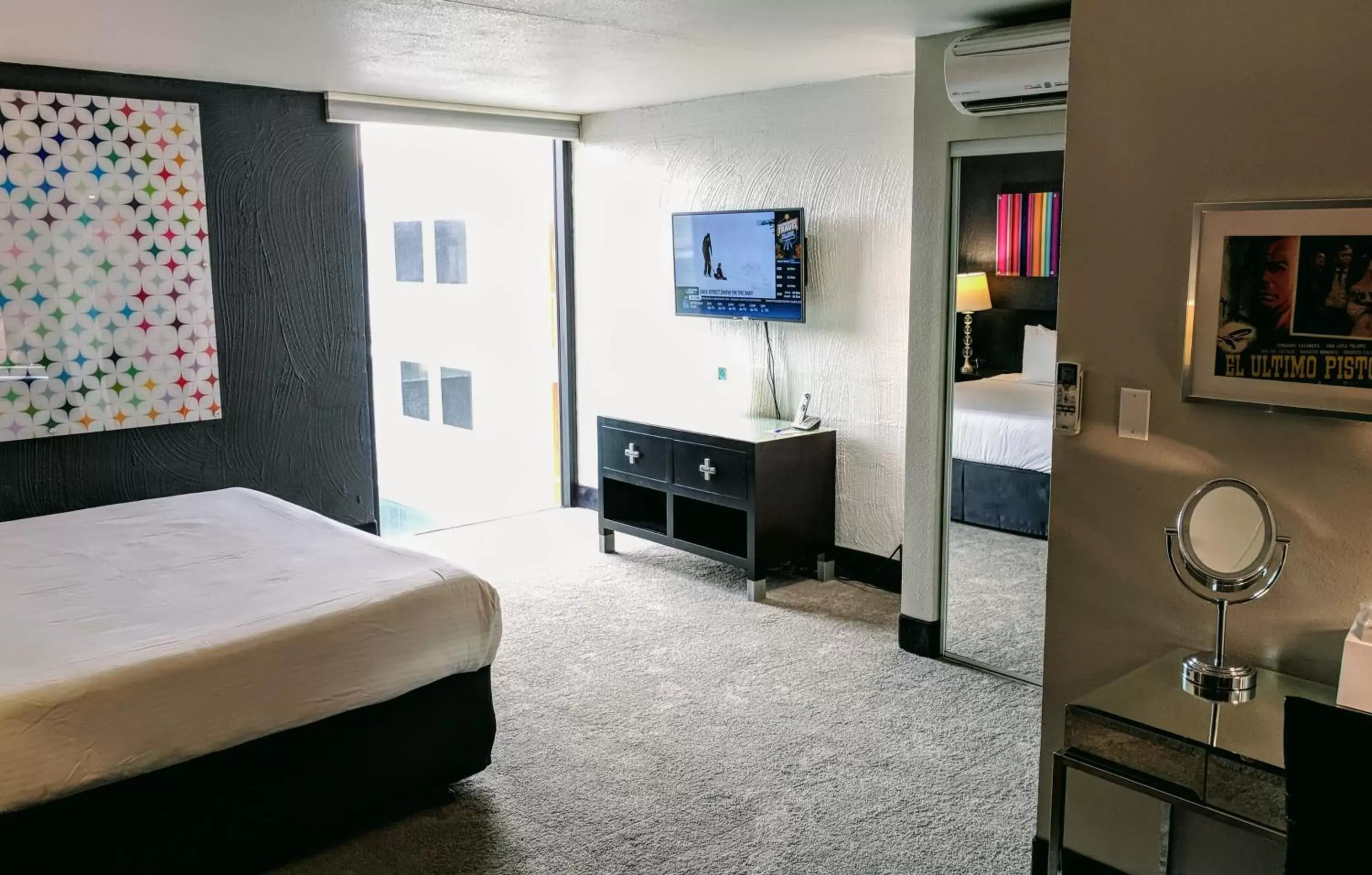 Bedroom, TV/Entertainment Center in The Clarendon Hotel and Spa
