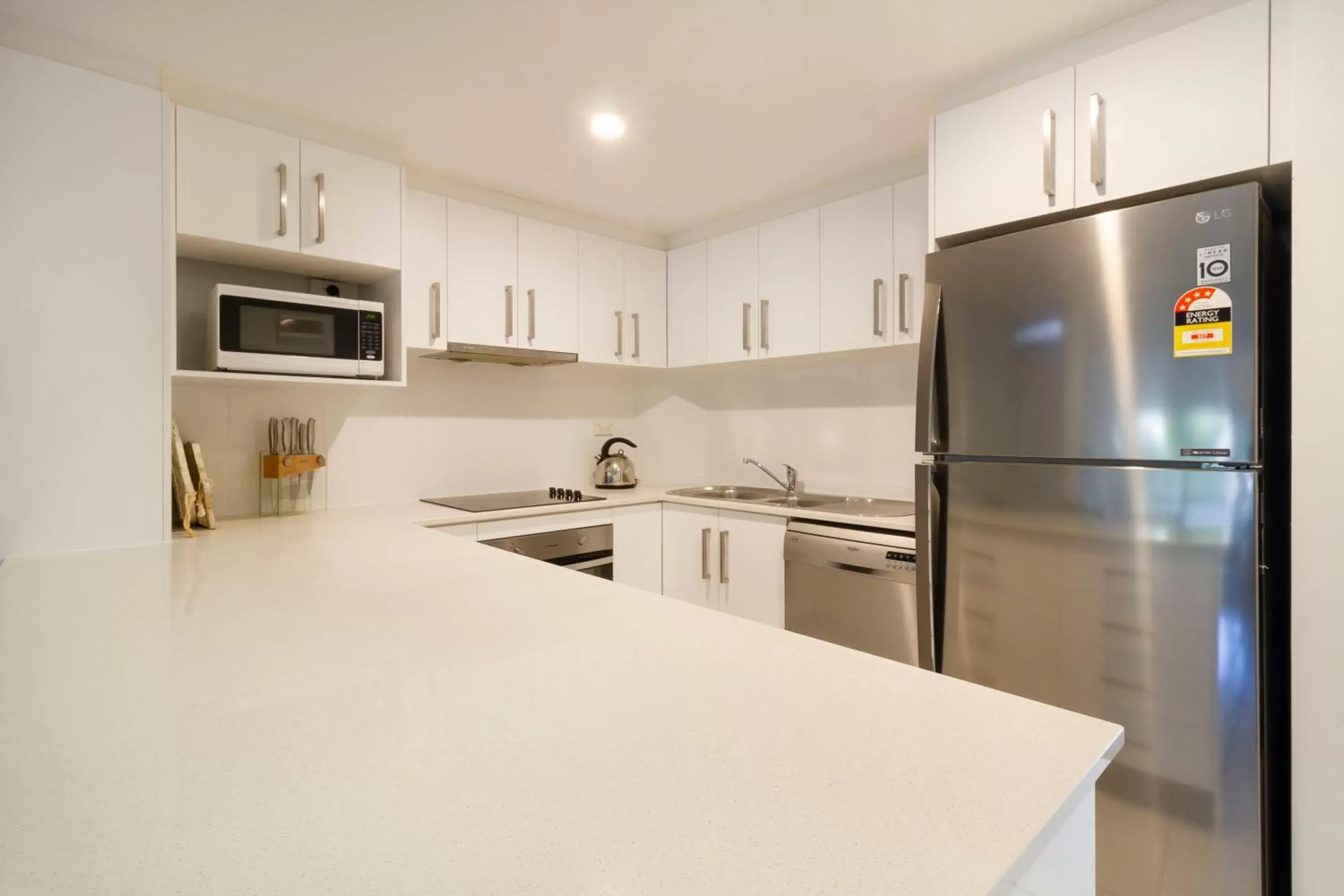 Kitchen/Kitchenette in The White House Port Douglas