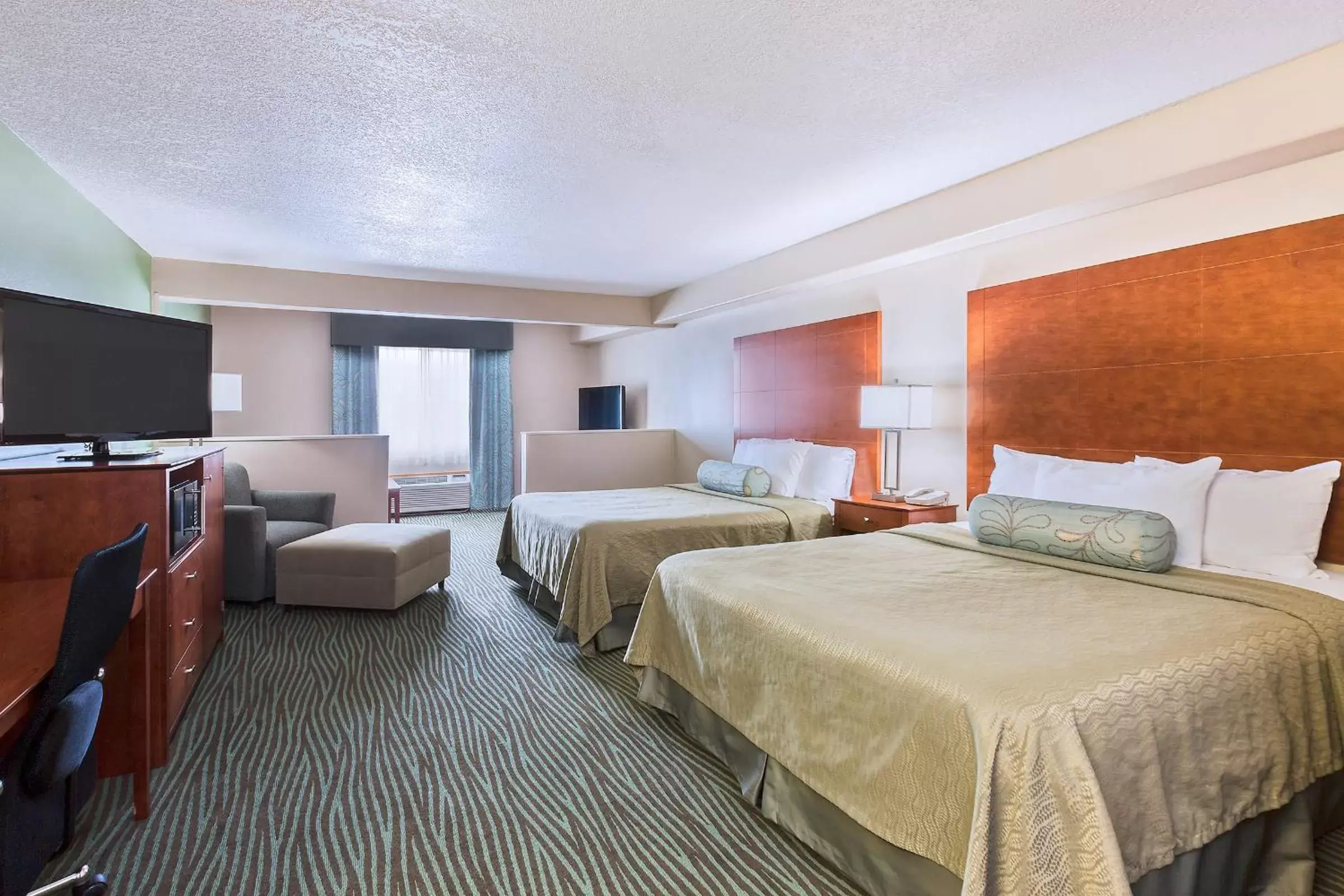 Bed in AmericInn by Wyndham Des Moines Airport