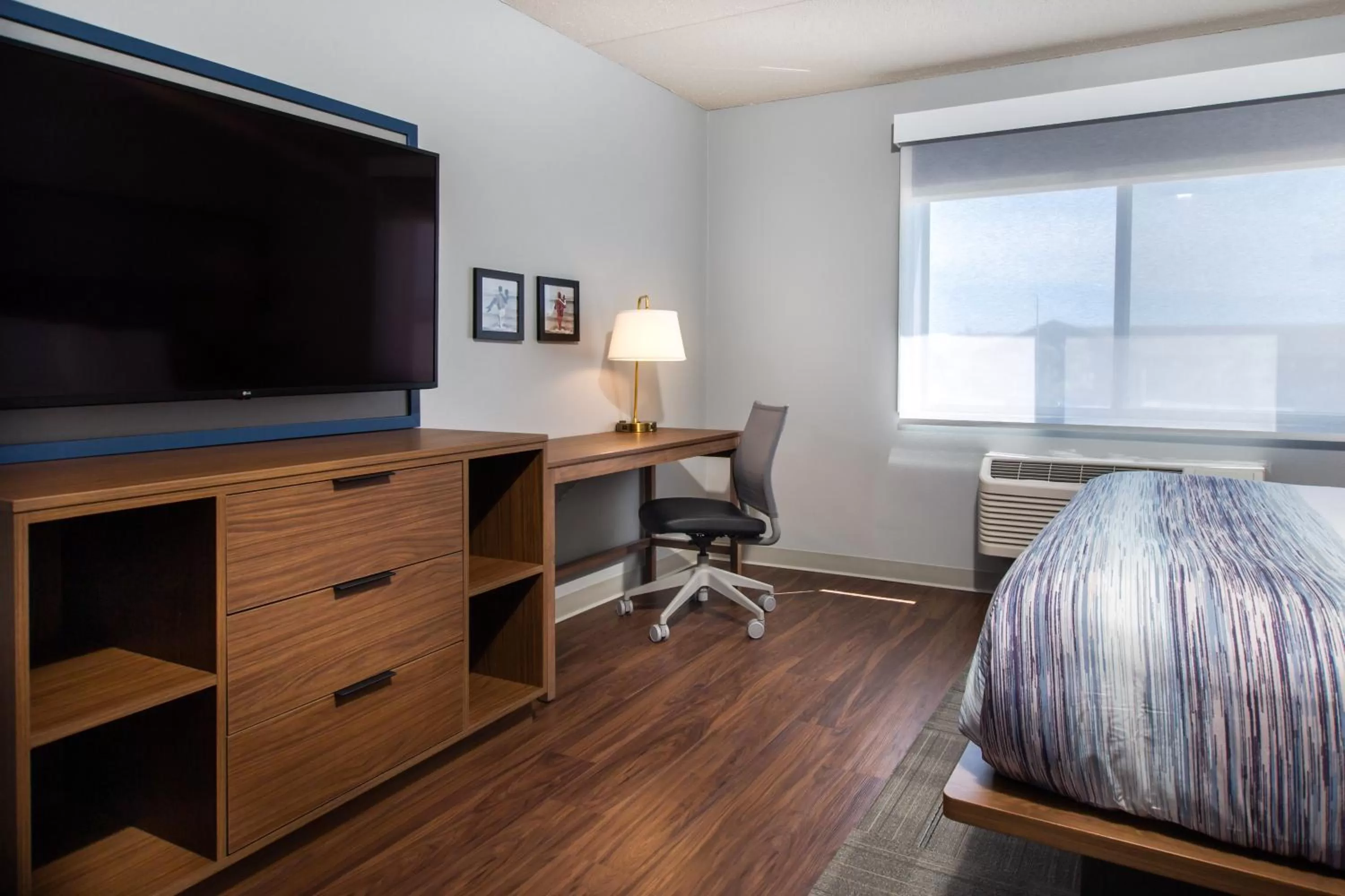 TV and multimedia, Bed in AmericInn by Wyndham Rapid City