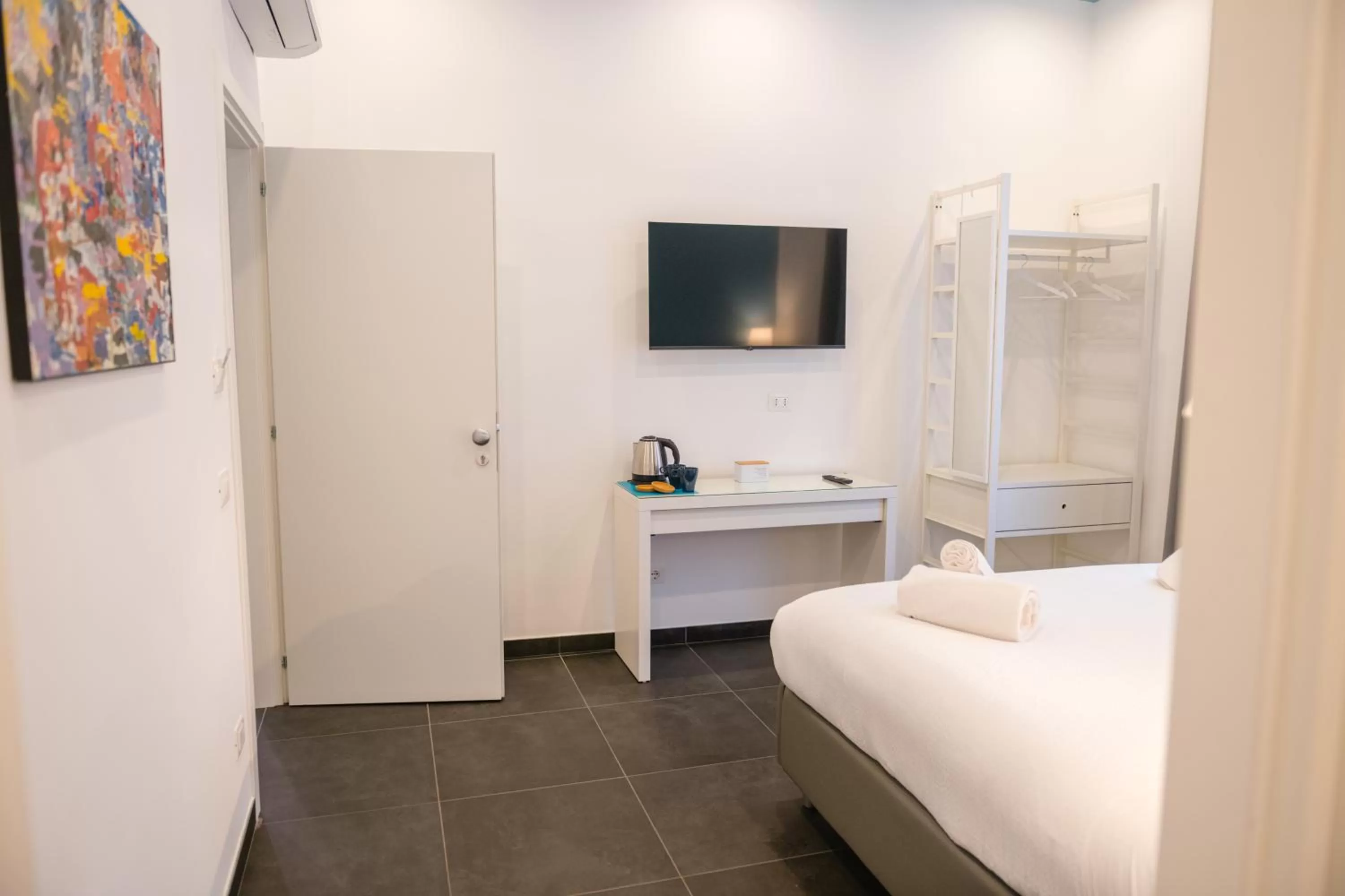 Bedroom, TV/Entertainment Center in Le Porte di Partenope