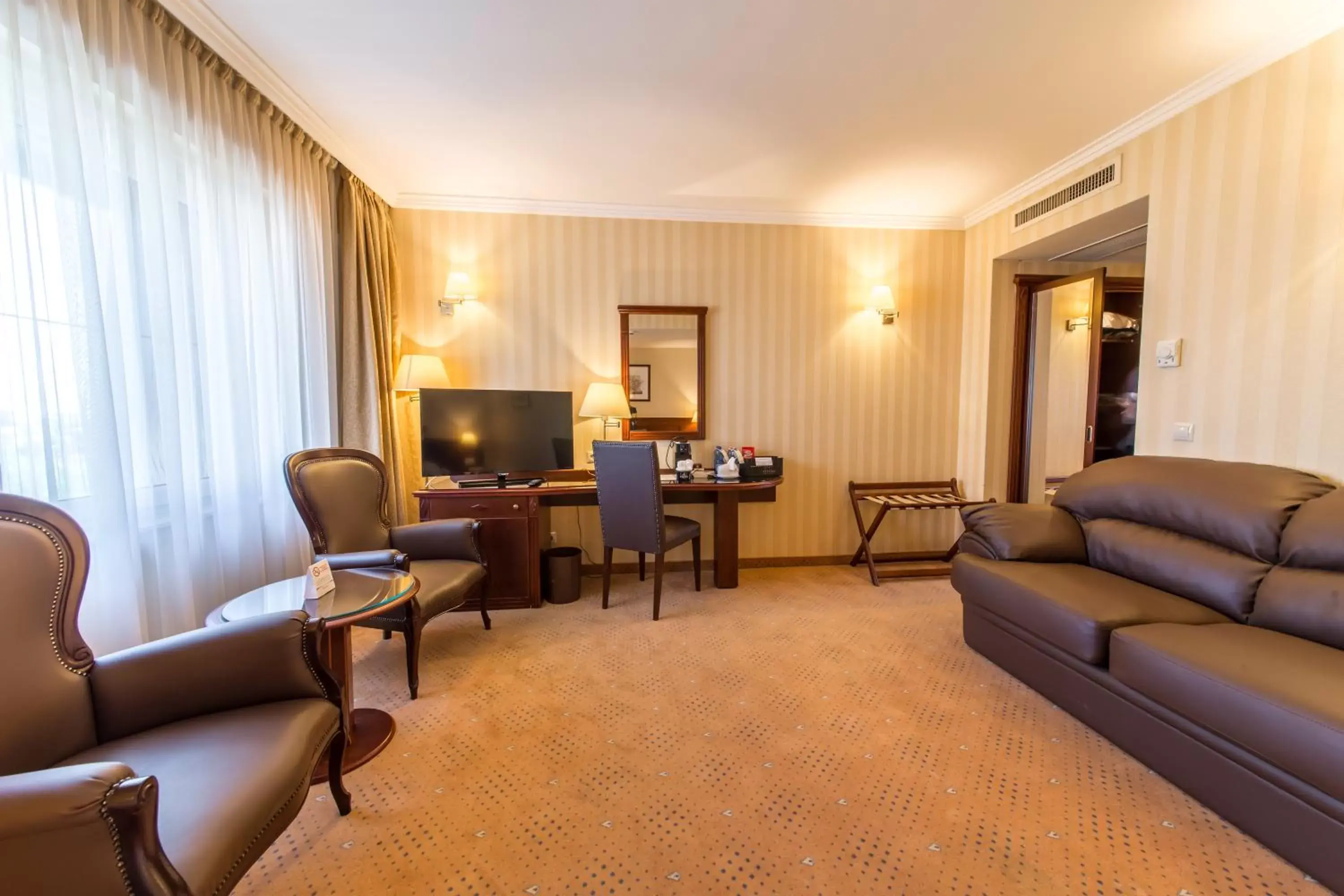 Seating Area in Ramada Hotel & Suites by Wyndham Bucharest North