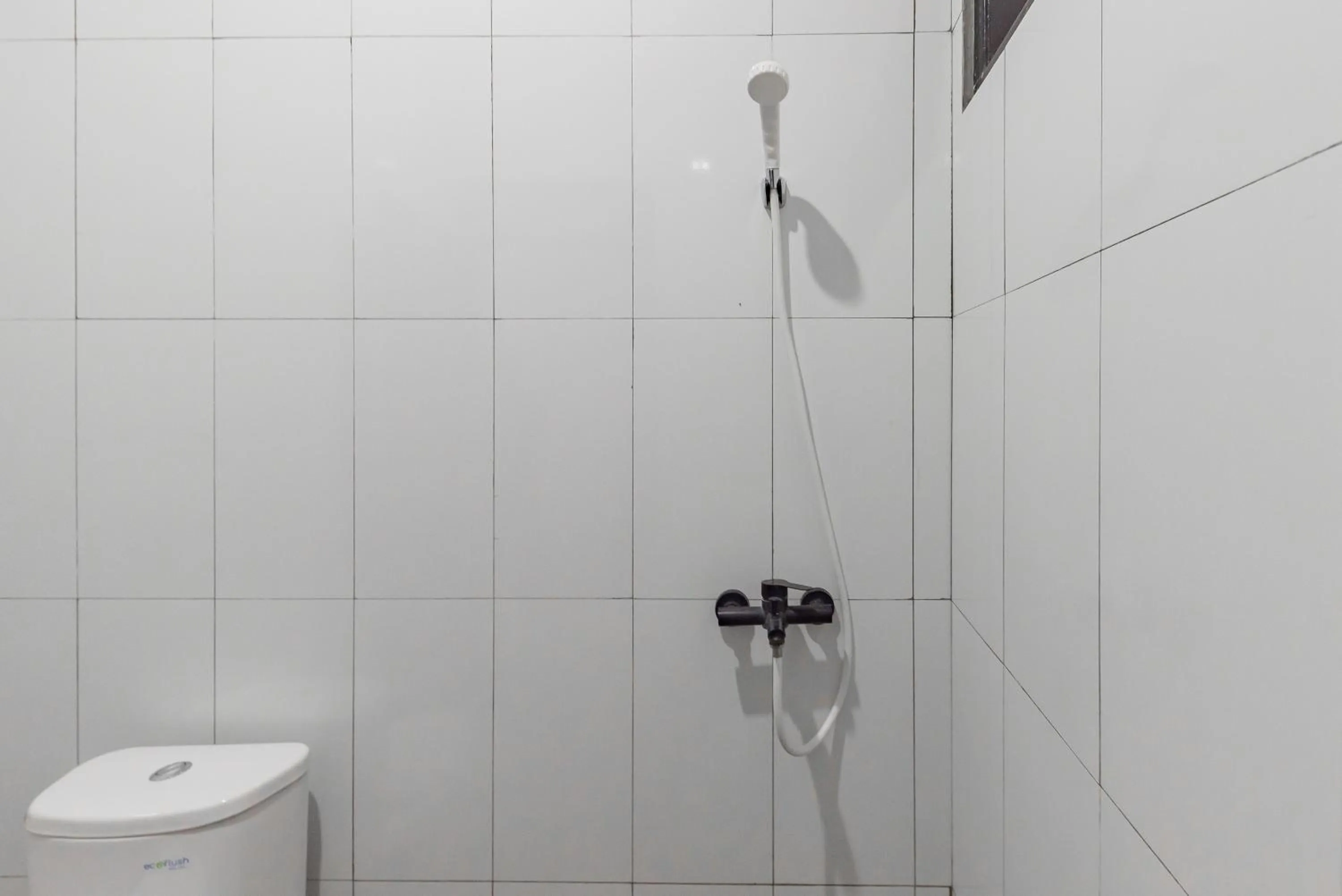 Bathroom in RedDoorz near Taman Kota Lapang Merdeka Sukabumi