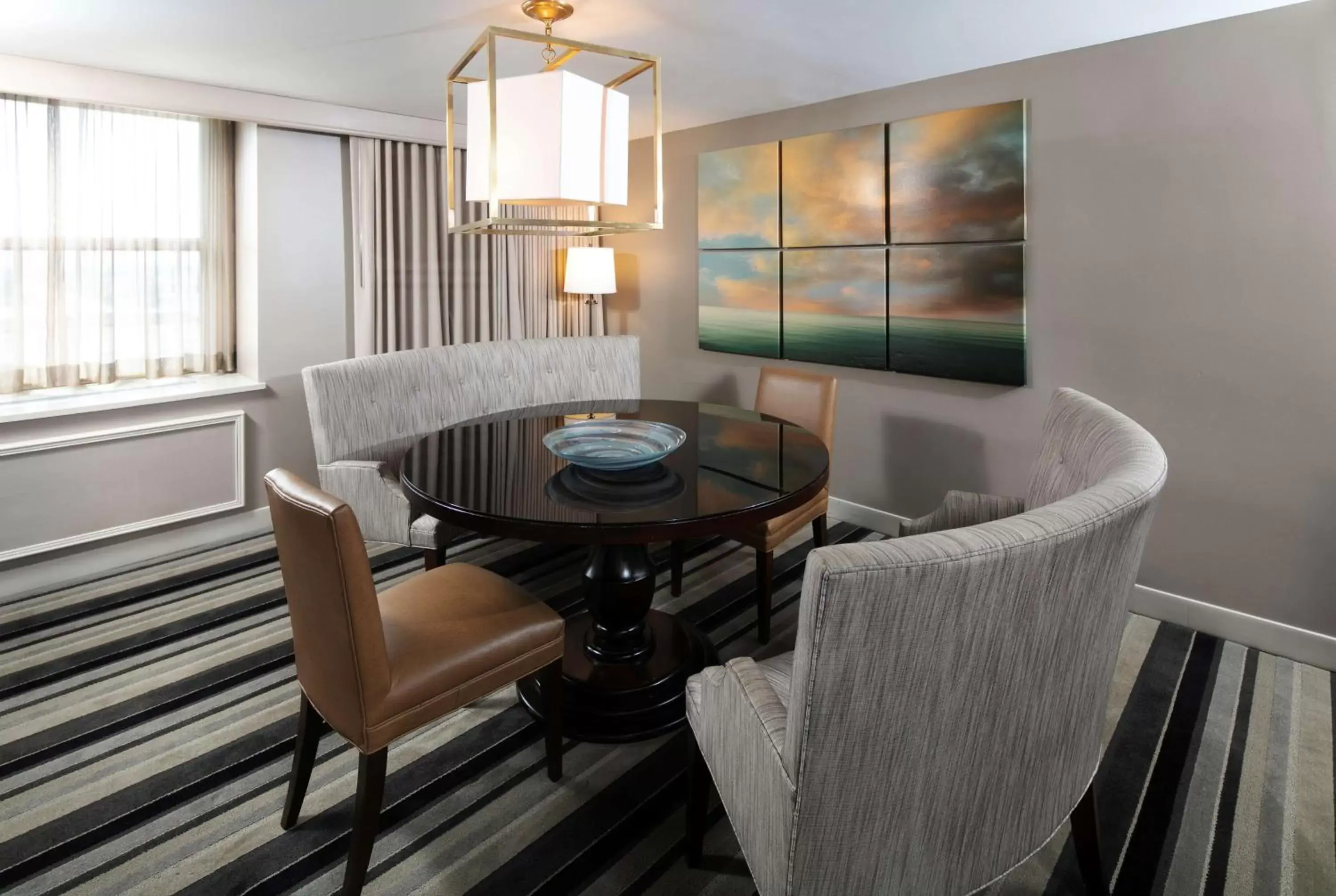 Living room, Dining Area in Hilton Milwaukee City Center