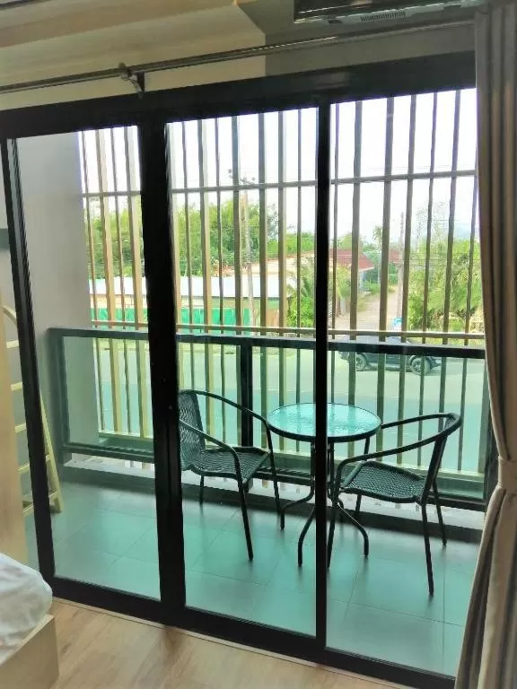 Balcony/Terrace, Pool View in La La Moon Krabi Poshtel'n' Pool