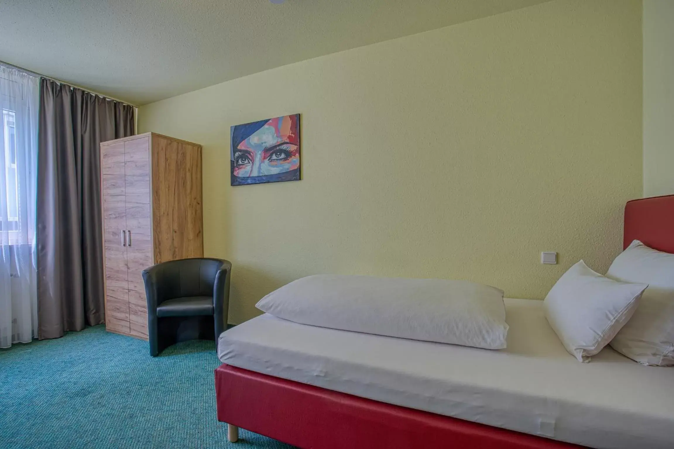 Photo of the whole room, Bed in Centro Hotel Böblingen