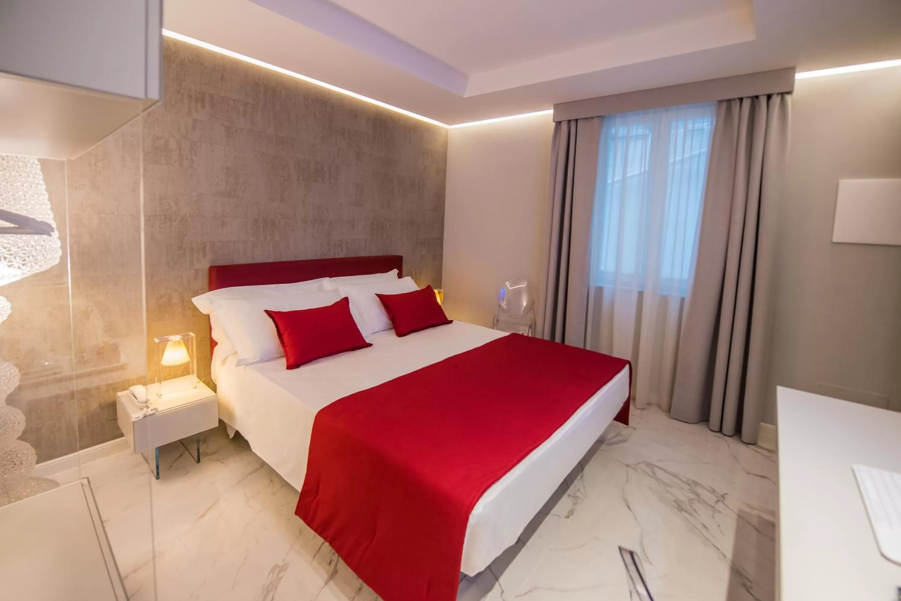 Bed in Palazzo Marletta Luxury House Hotel