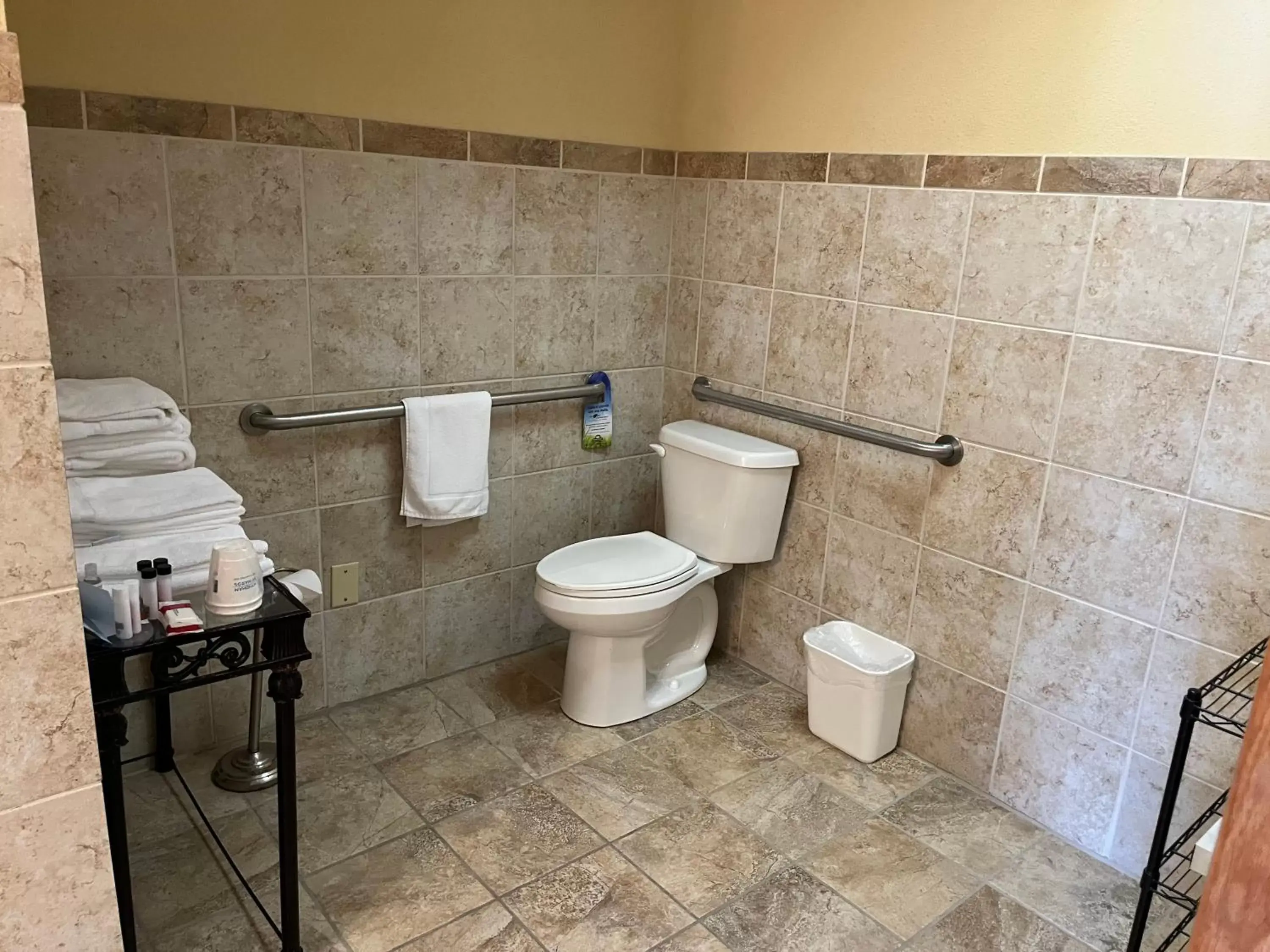 Bathroom in Days Inn & Suites by Wyndham Sutton Flatwoods